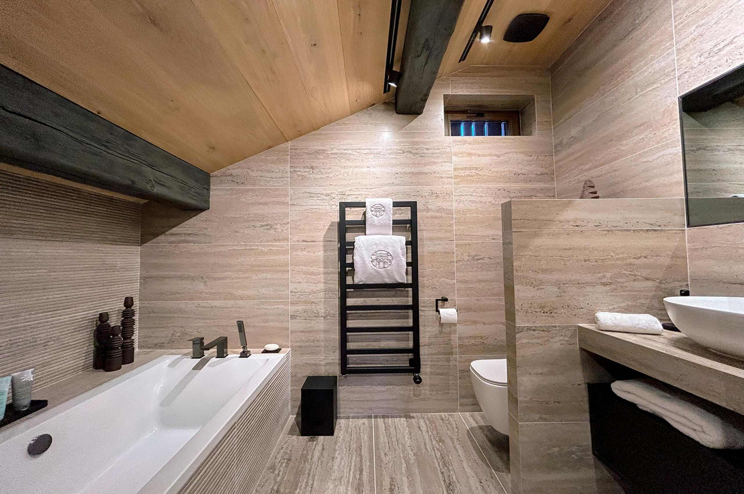chalet-harper-bathroom-bathtub-toilet-sink-modern-luxury-rental-retreat-megeve