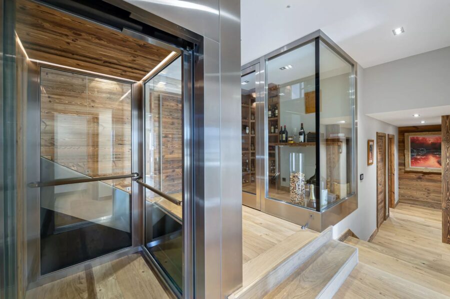 chalet-hollie-lift-staircase-entrance-hallway-luxury-rental-retreat-megeve