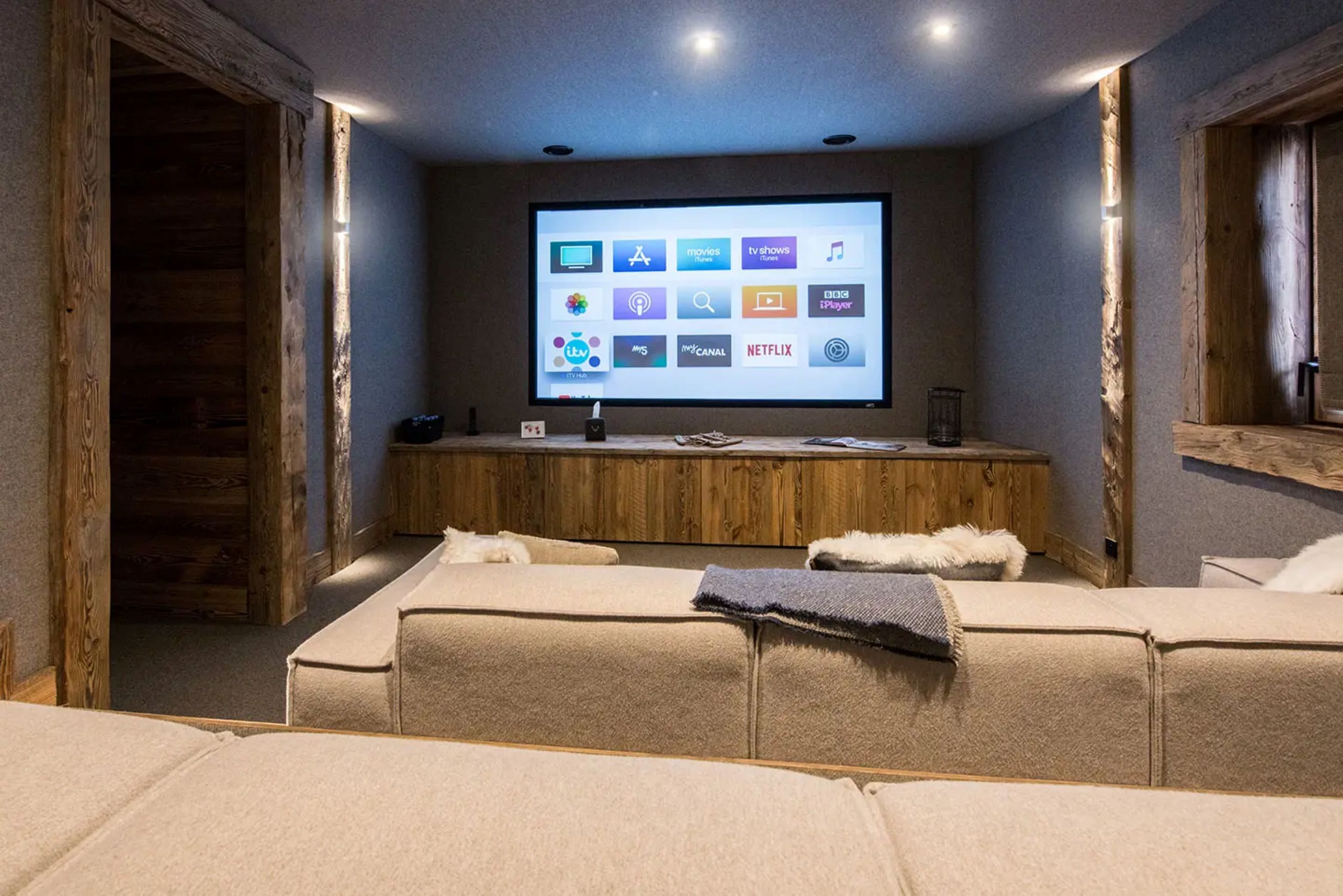 chalet-oralie-cinema-room-movie-night-family-entertainment-luxury-rental-vald'isere