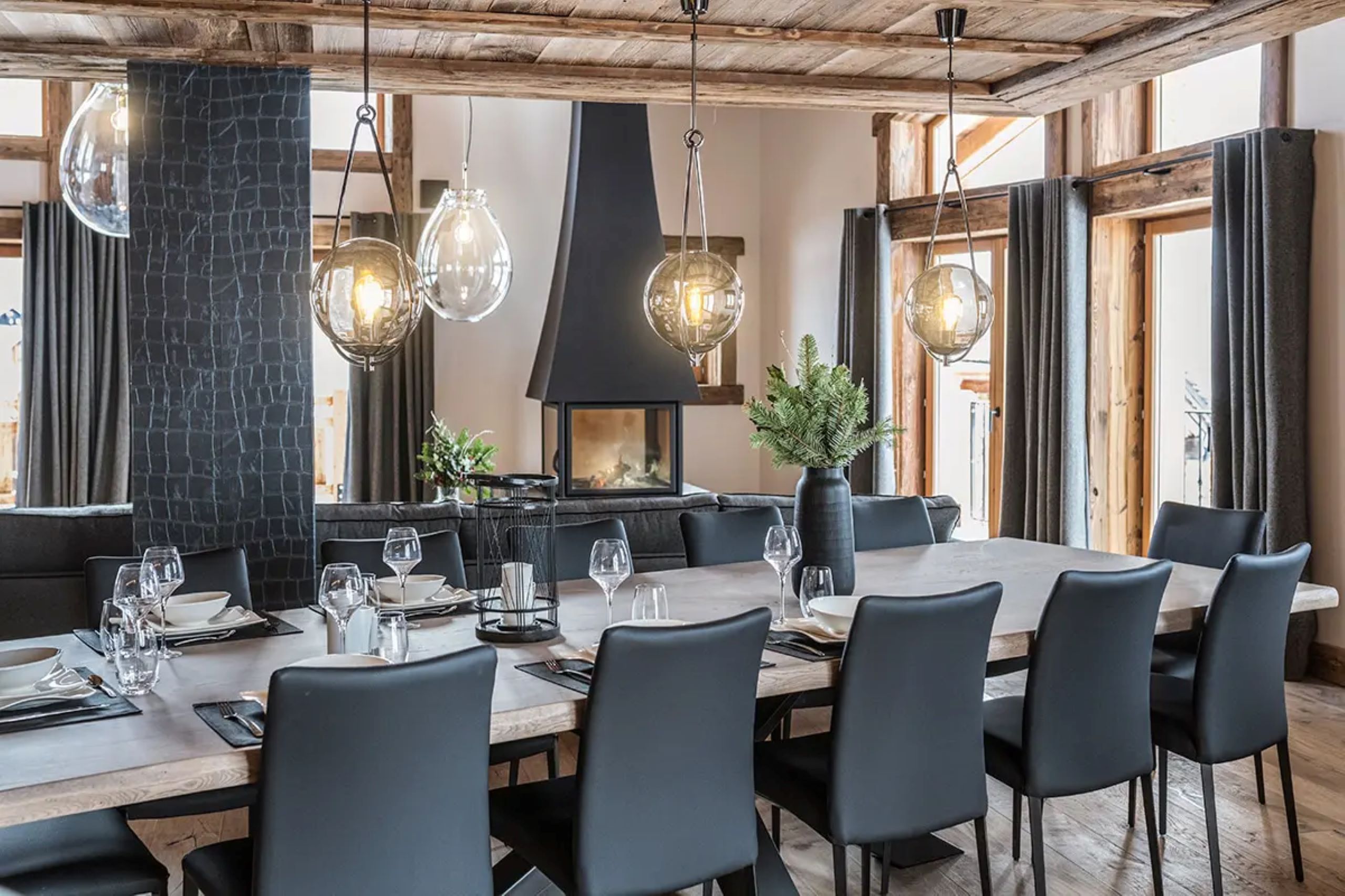 chalet-oralie-diningroom-living-space-fireplace-openplan-elegant-modern-stylish-sleek-design-luxury-vald'isere