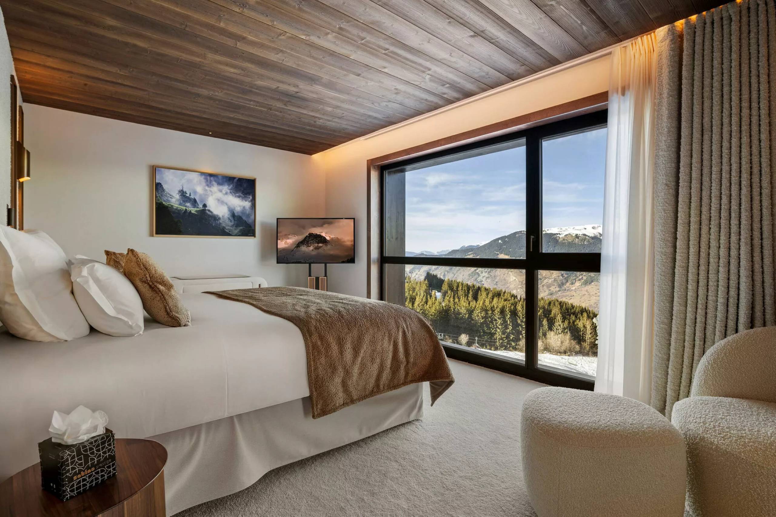 residence-aura-bedroom-mountain-view-elegant-modern-interiordesign-luxury-courchevel1850