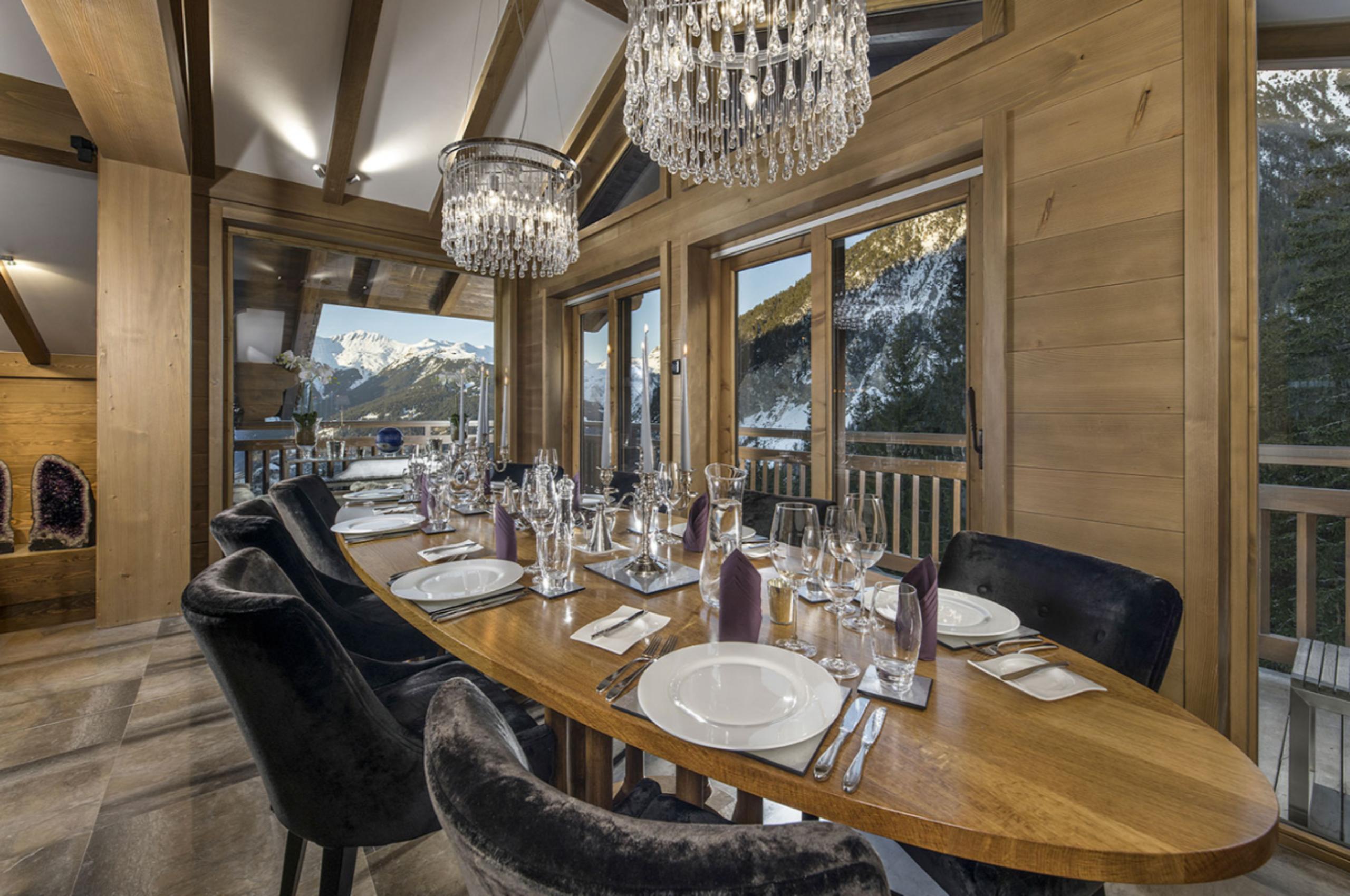 chalet-odile-mainpage-dining-room-mountain-views-elegant-alpine-design-luxury-courchevel1650