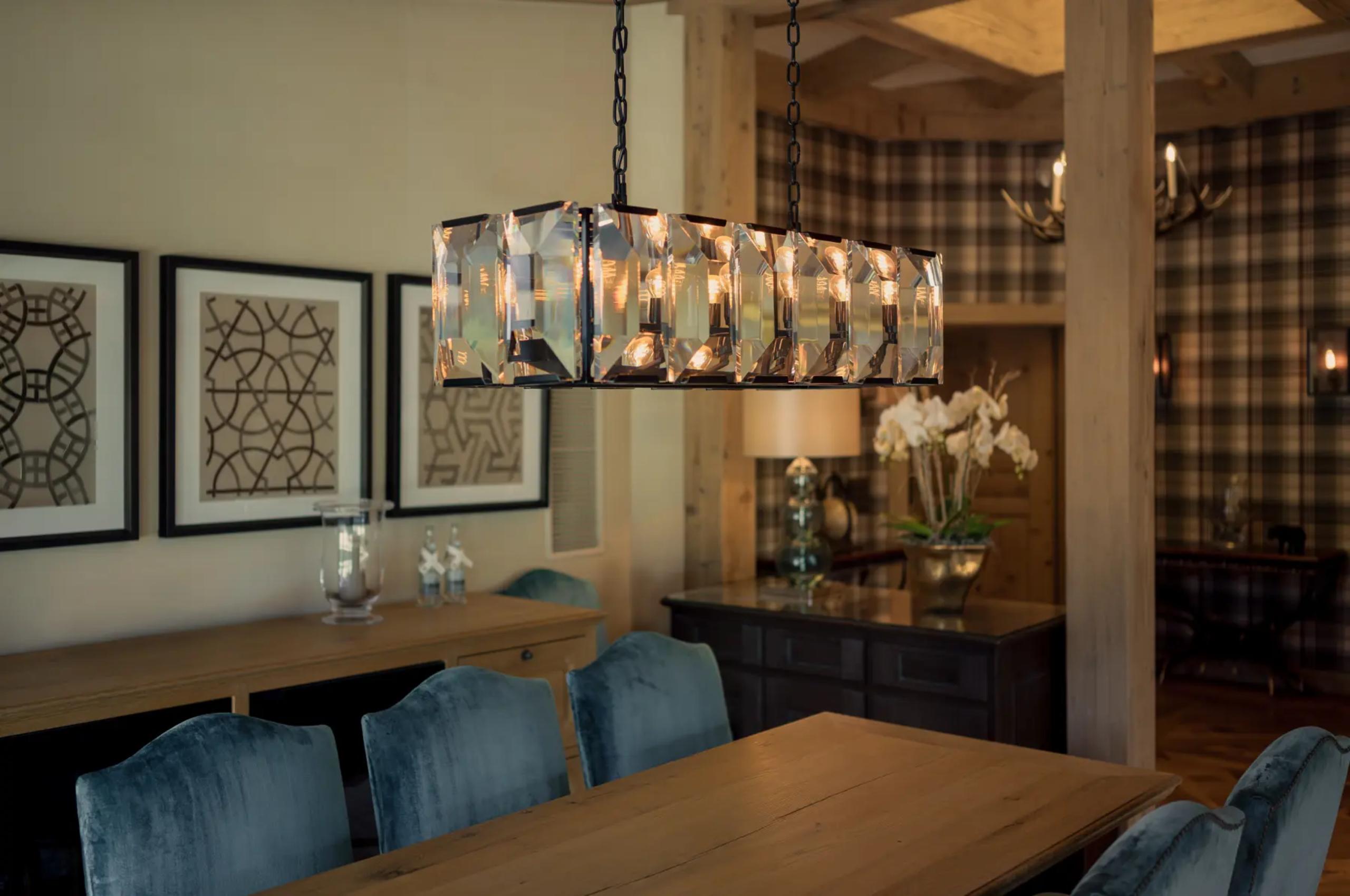 residence-grace-diningroom-lighting-elegant-alpine-design-luxury-gstaad