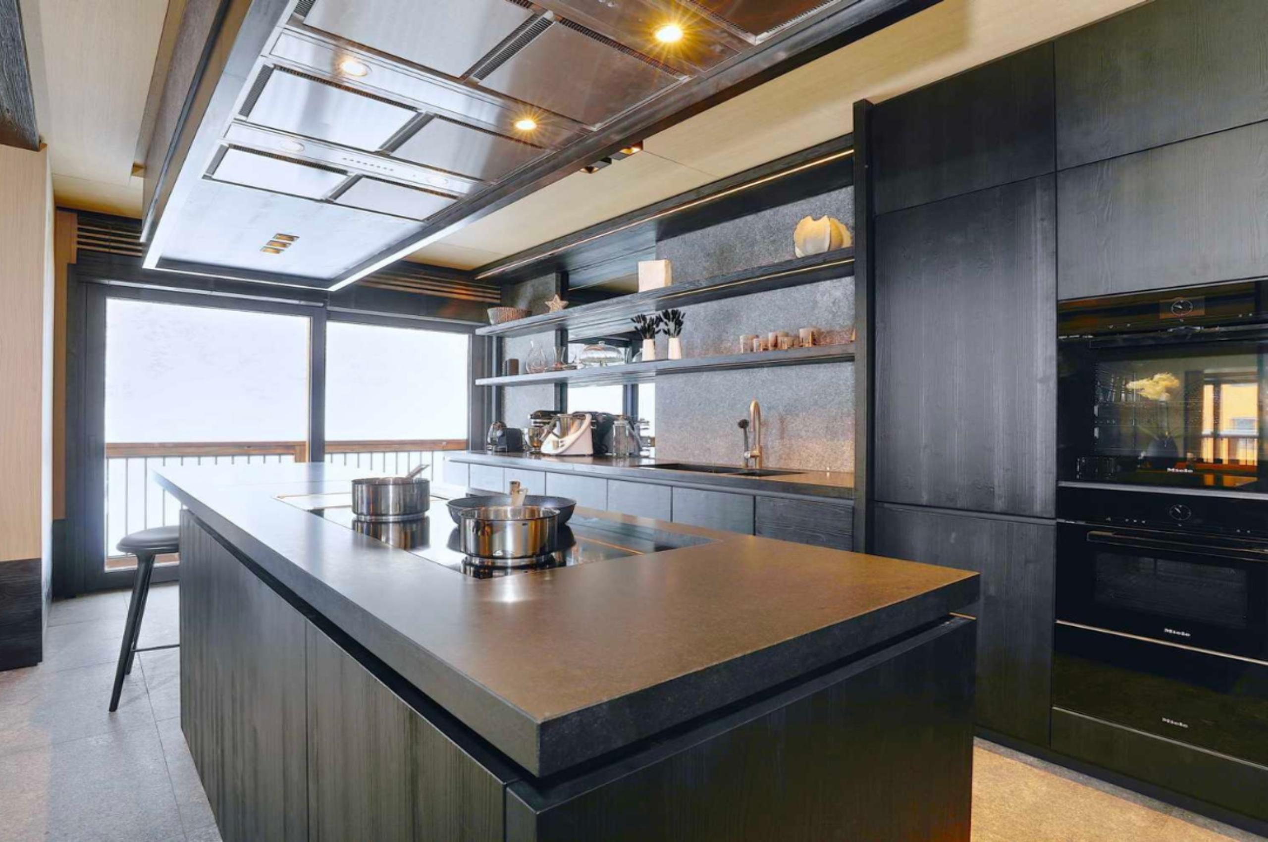 residence-kailey-kitchen-sleek-modern-design-alpine-view-balcony-luxury-courchevel1850