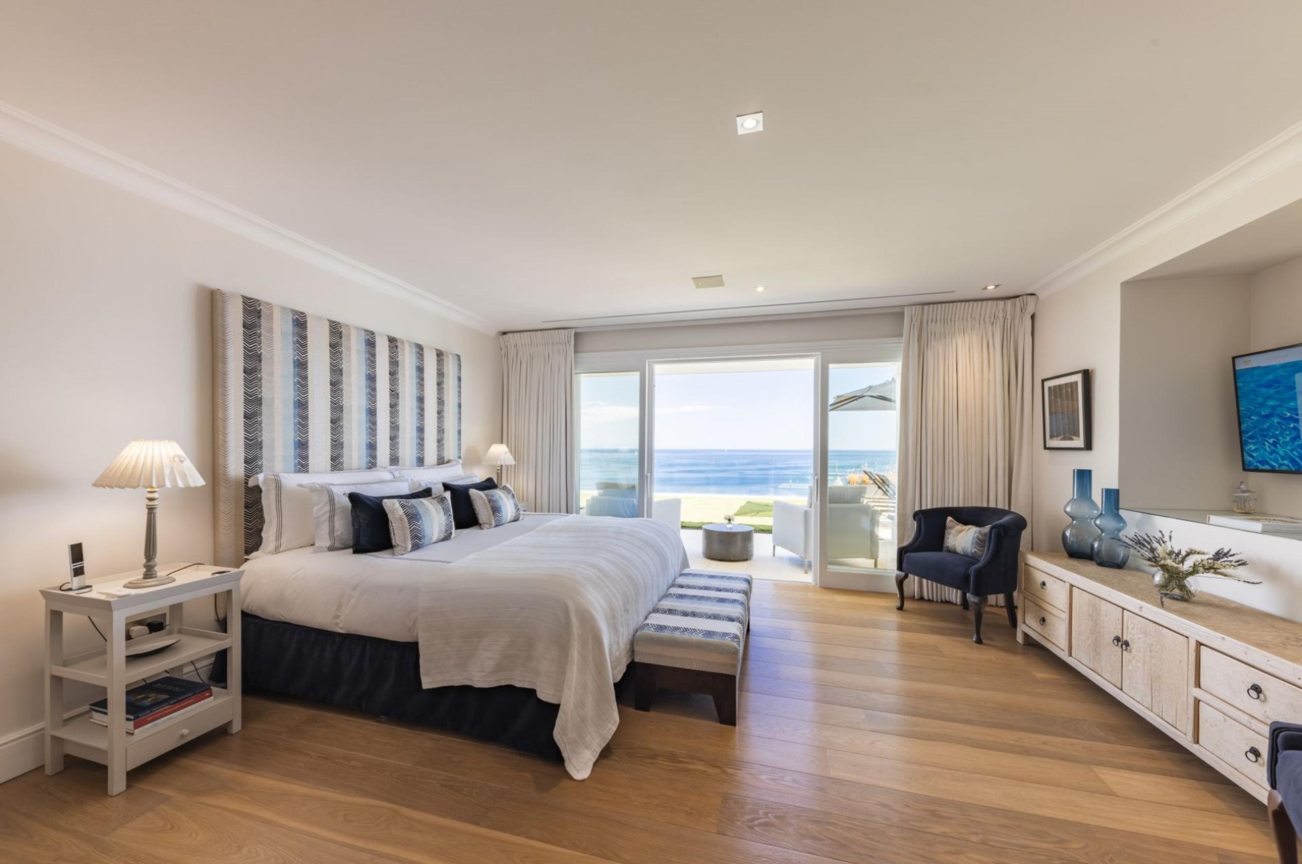 villa-chara-bedroom-balcony-stunning-sea-views-elegant-serene-interior-luxury-corfu