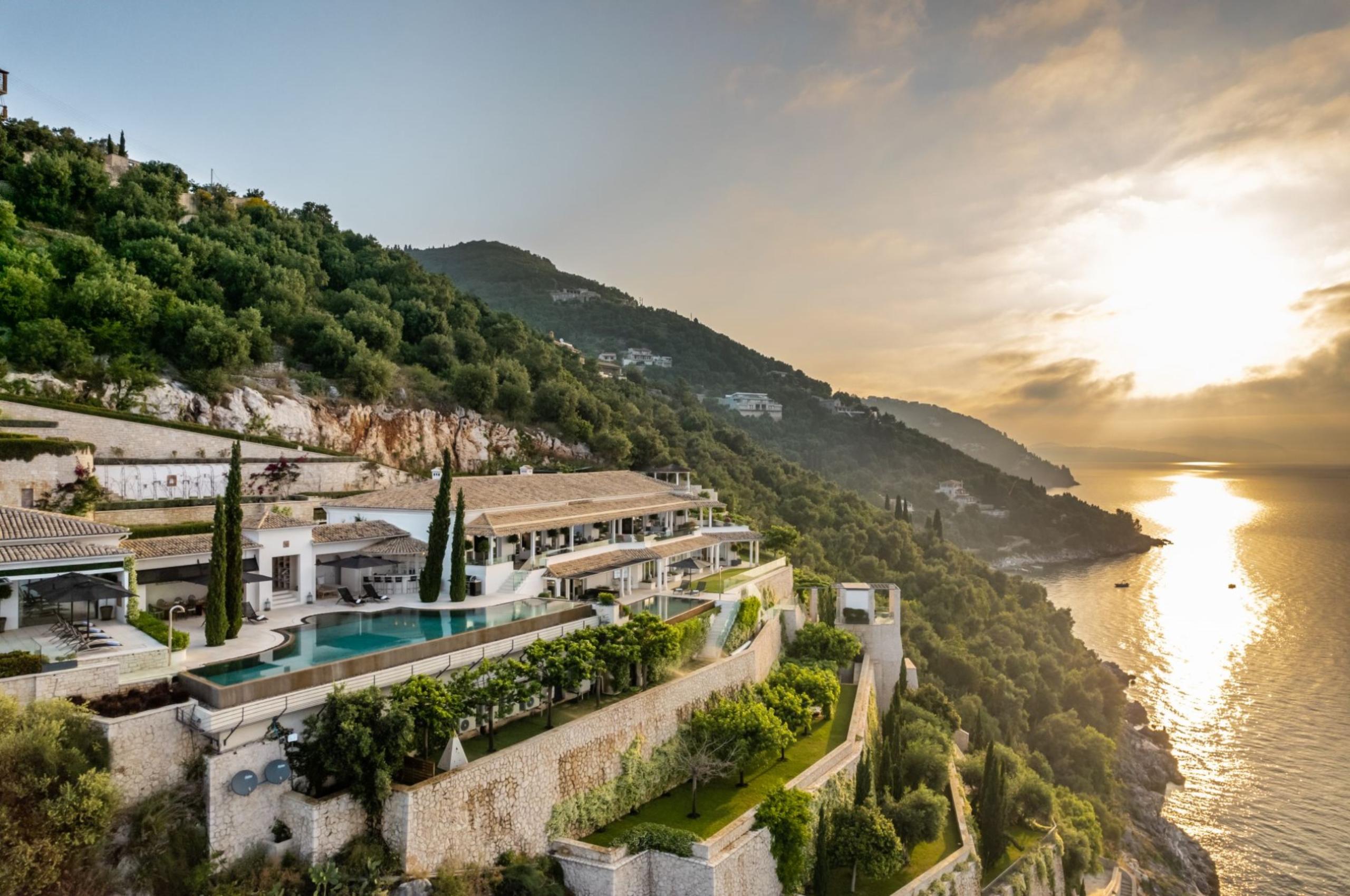 villa-chara-exterior-sea-front-luxury-retreat-infinity-pool-gardens-ocean-views-luxury-corfu