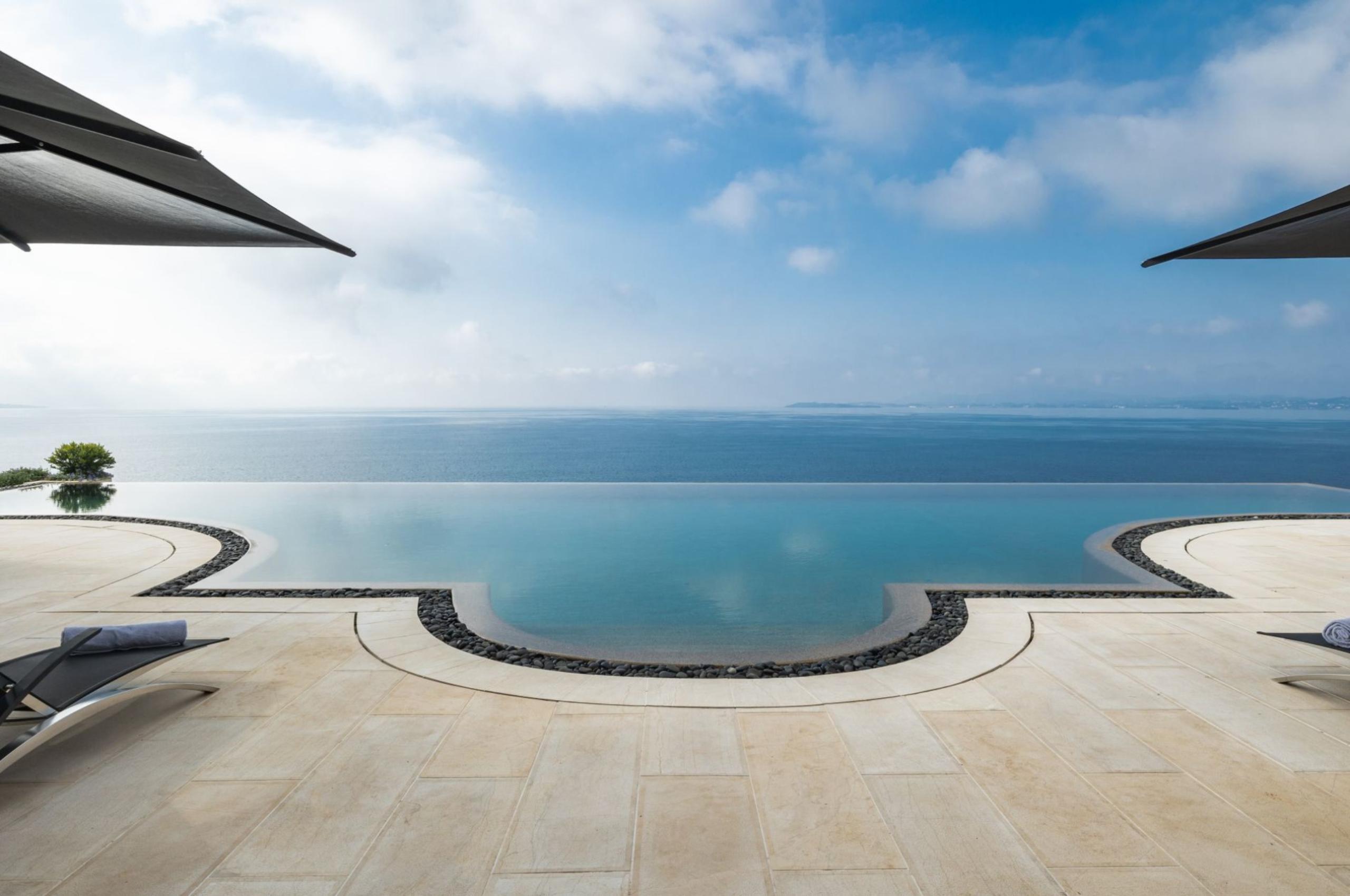 villa-chara-infinity-pool-stunning-sea-views-terrace-sun-loungers-luxury-ocean-front-retreat-corfu