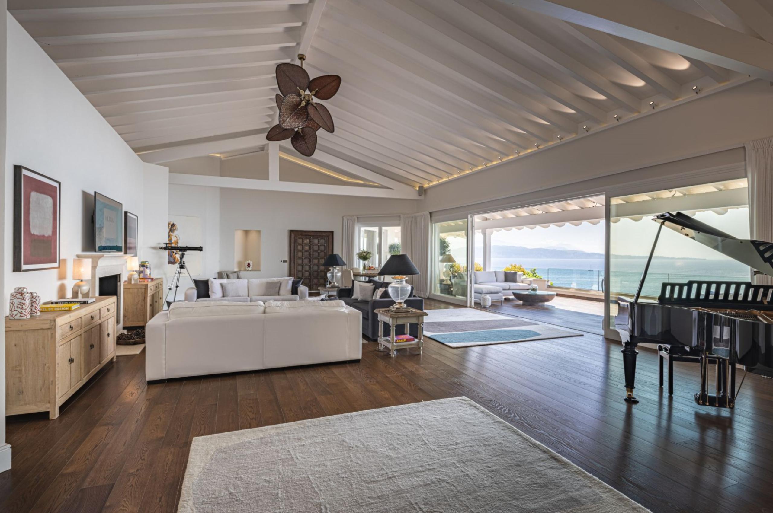 villa-chara-living-room-lounge-piano-terrace-sea-views-grand-elegant-interior-luxury-corfu