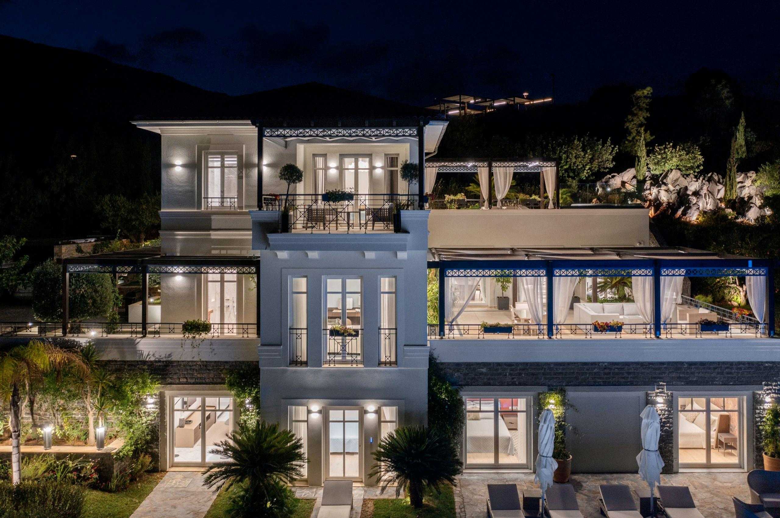 villa-dalida-exterior-night-balconies-garden-swimming-pool-exclusive-rental-luxury-retreat-crete