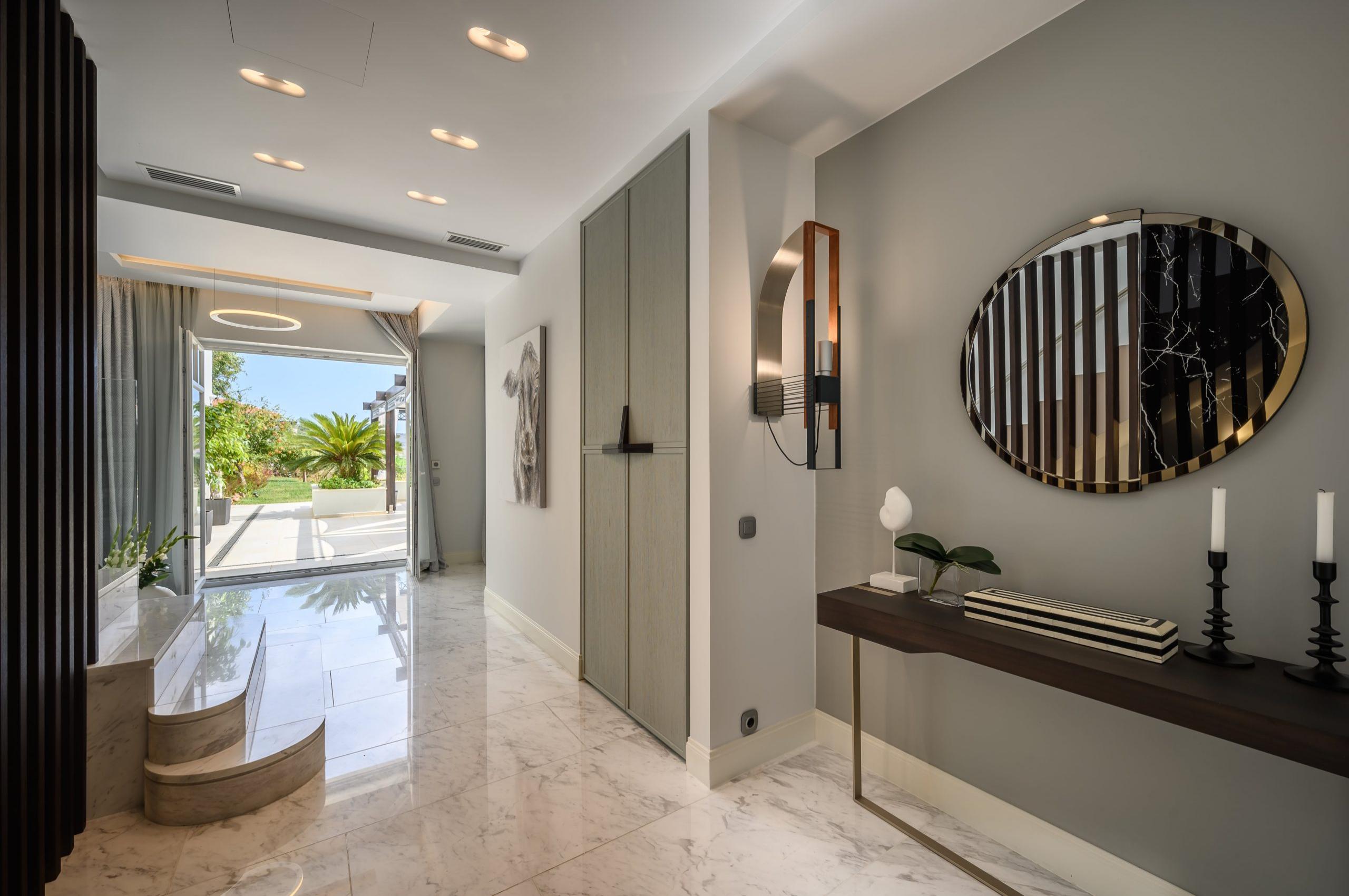villa-dalida-hallway-entrance-garden-view-sleek-modern-design-luxury-crete