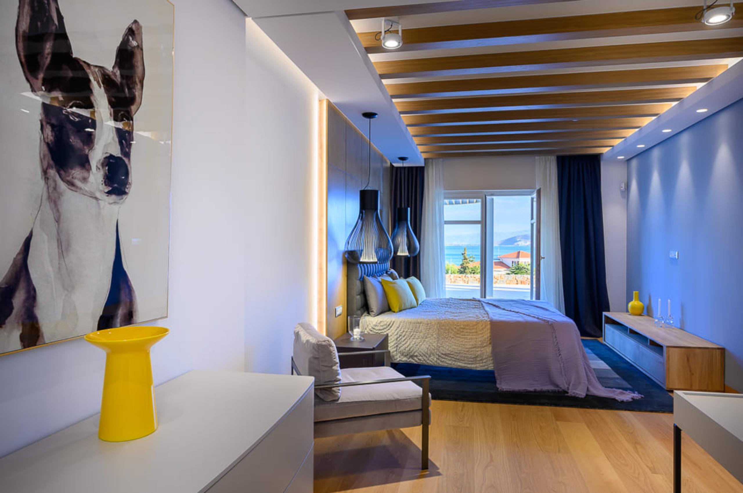 villa-octavia-bedroom-spacious-sleek-modern-design-sea-view-terrace-access-luxury-crete