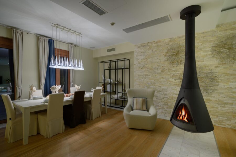 villa-una-dining-room-hanging-fireplace-elegant-design-luxury-crete