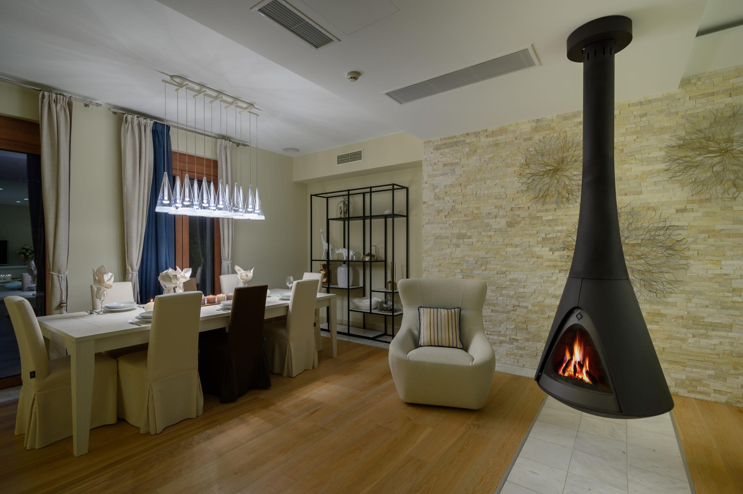 villa-una-dining-room-hanging-fireplace-elegant-design-luxury-crete