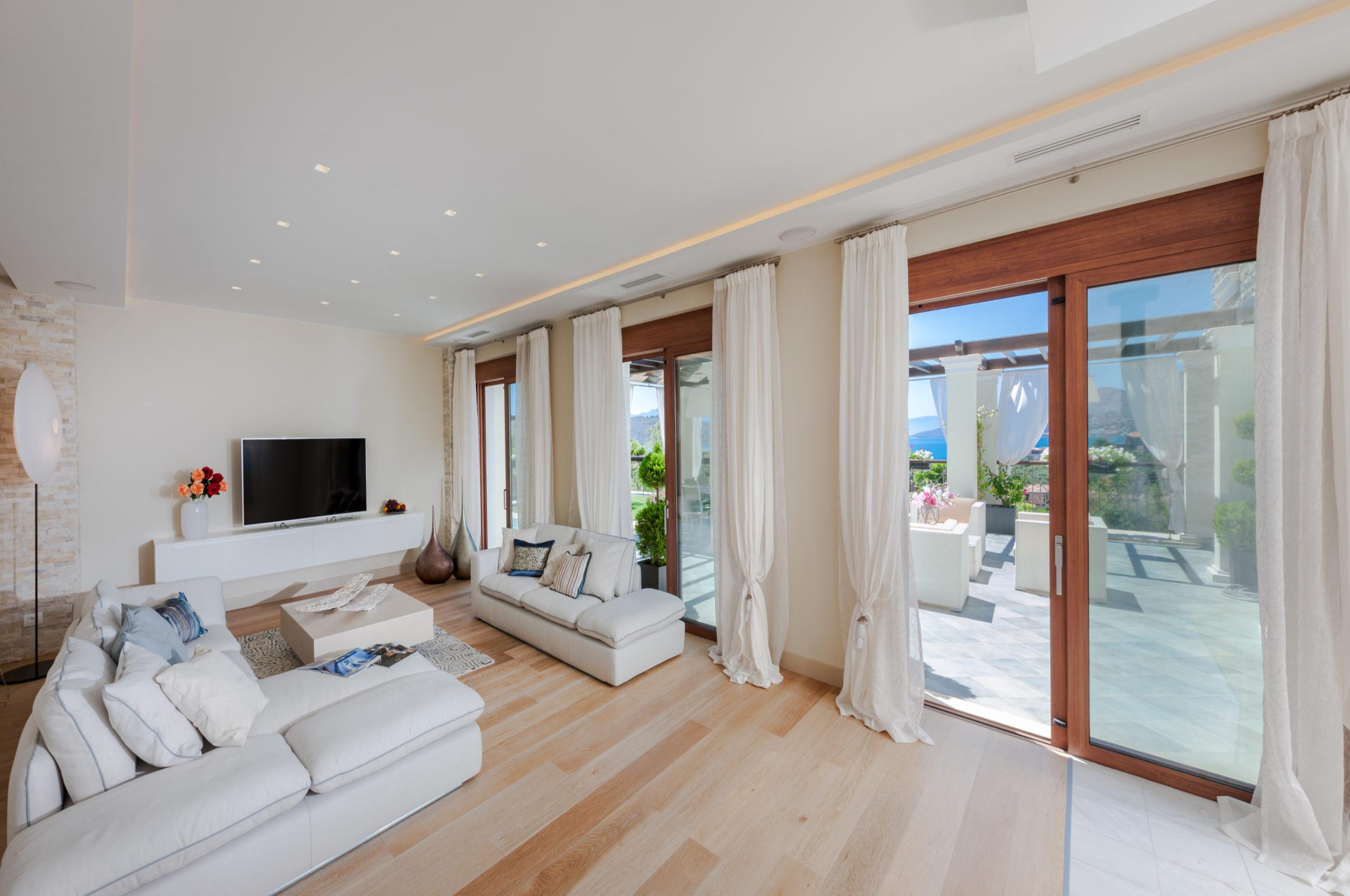 villa-una-living-room-sea-view-terrace-access-bright-spacious-design-luxury-crete