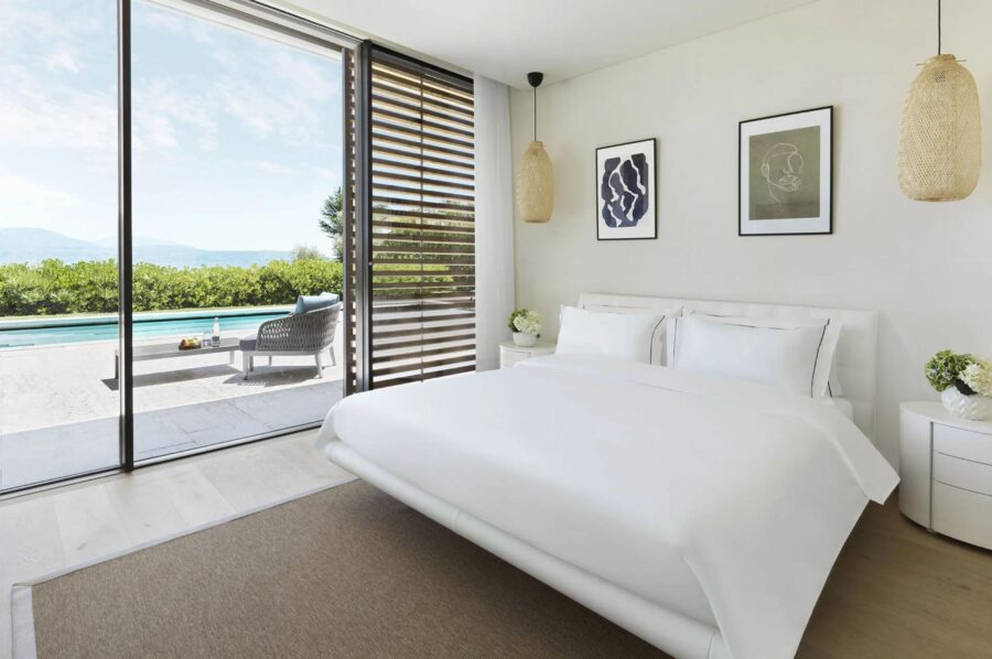 villa-luna-bedroom-terrace-pool-view-sleek-modern-serene-design-luxury-lakegarda