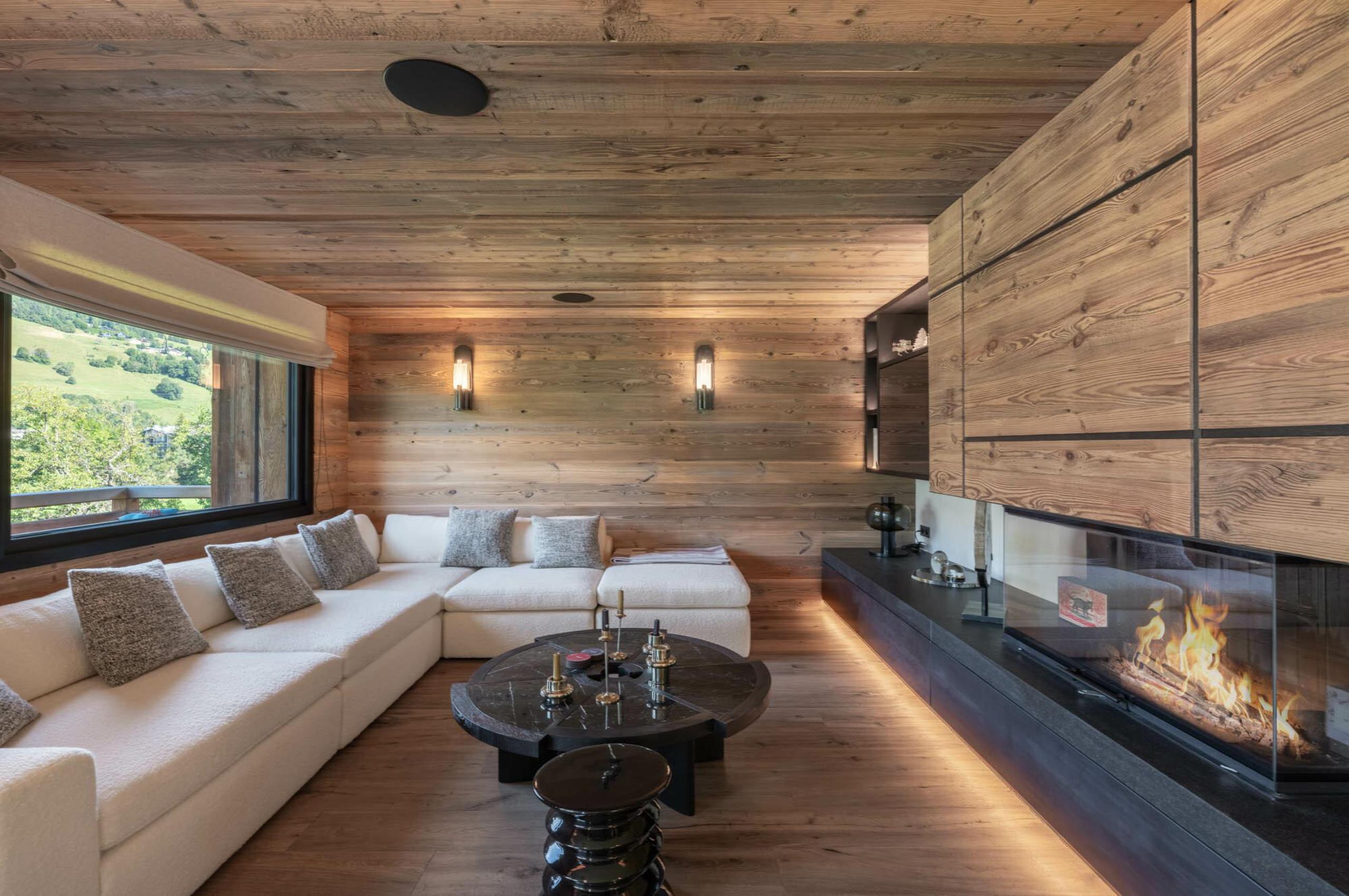 chalet-griselda-lounge-fireplace-cosy-alpine-interiors-luxury-megeve