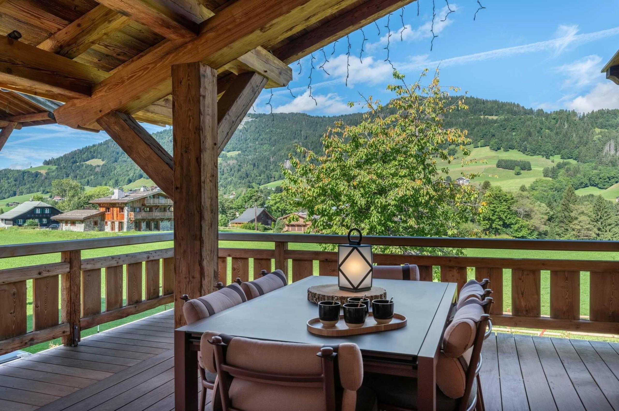 chalet-griselda-terrace-alfresco-dining-scenic-alpine-views-luxury-megeve