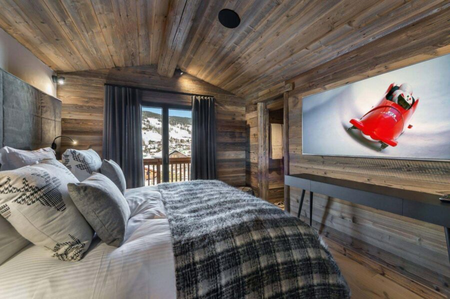 chalet-lara-bedroom-modern-alpine-interiors-tv-luxury-megeve