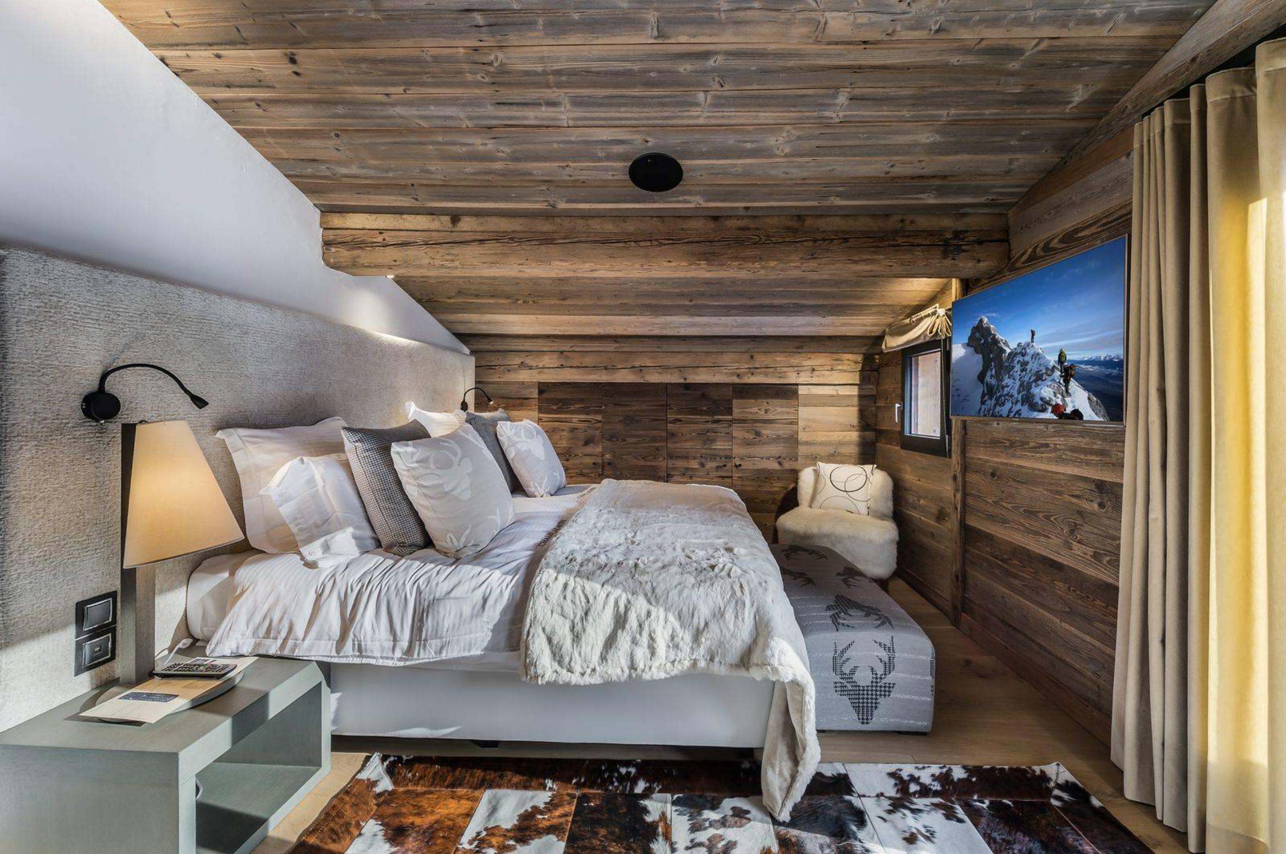 chalet-lara-bedroom-tv-elegant-alpine-design-luxury-megeve