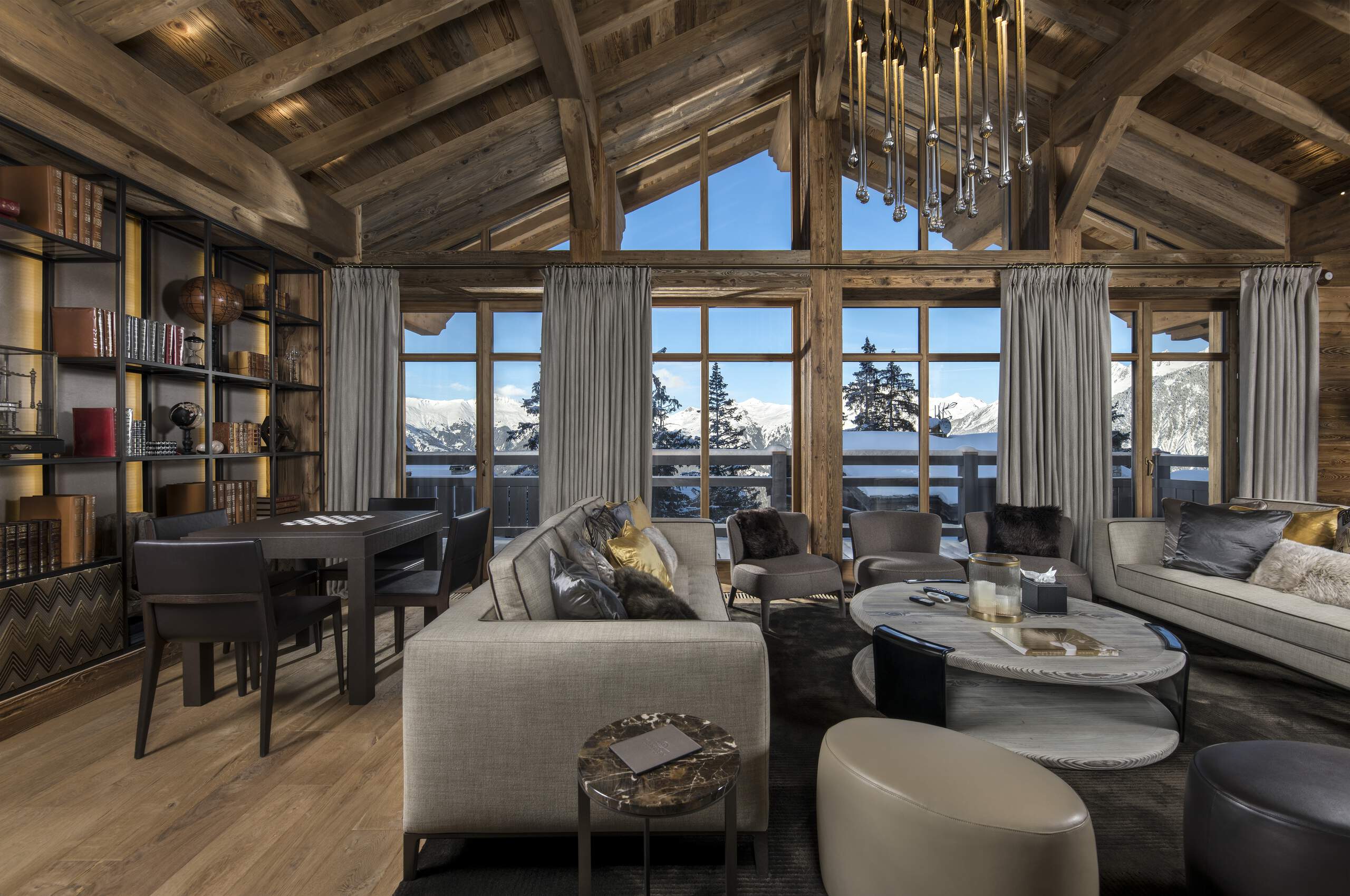 chalet-anastasia-mainpage-livingroom-openplan-mountainviews-elegant-alpine-design-courchevel1850-luxury