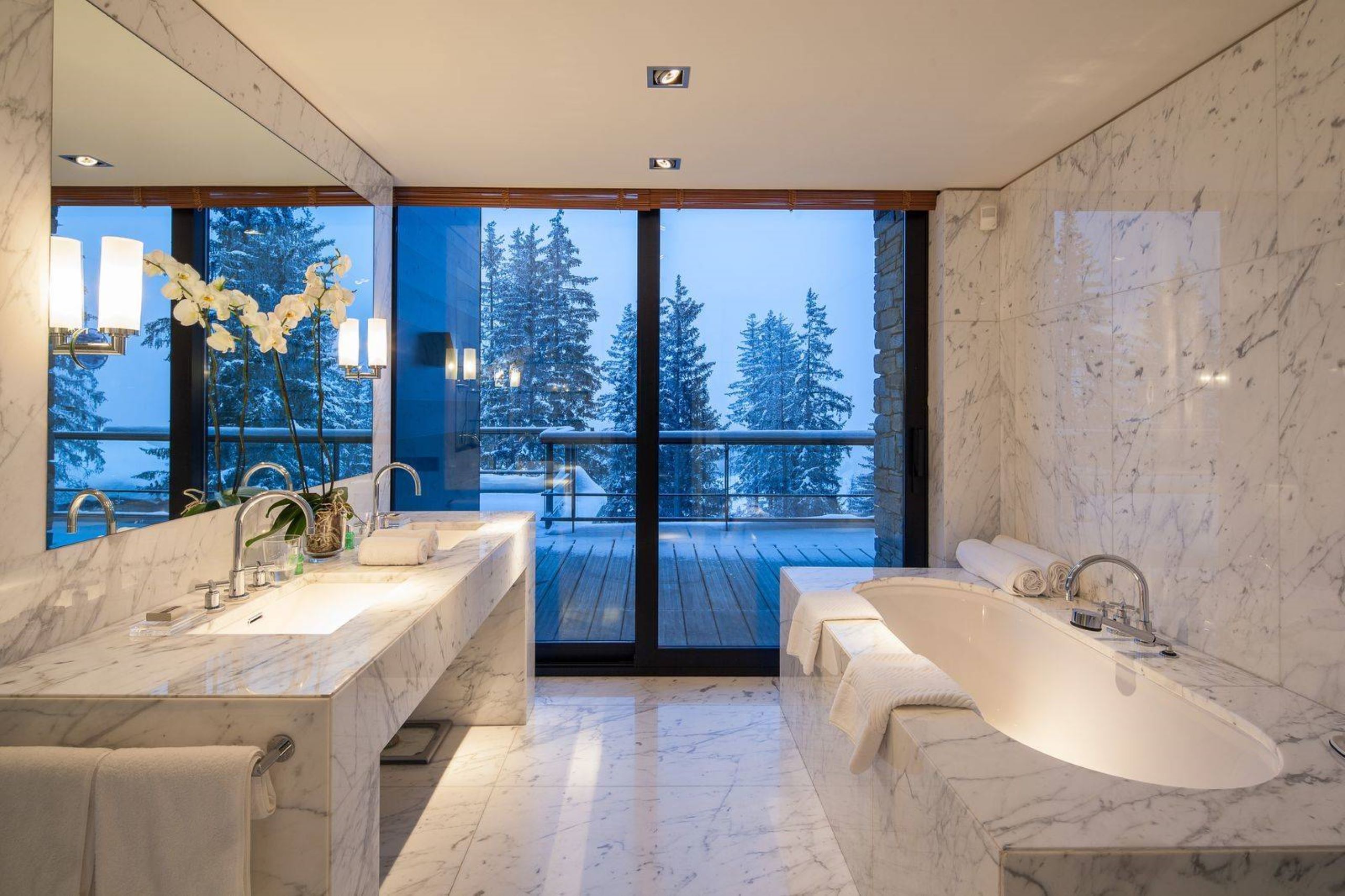 chalet-giselle-bathroom-balcony-forest-views-sleek-modern-marble-design-luxury-courchevel1850