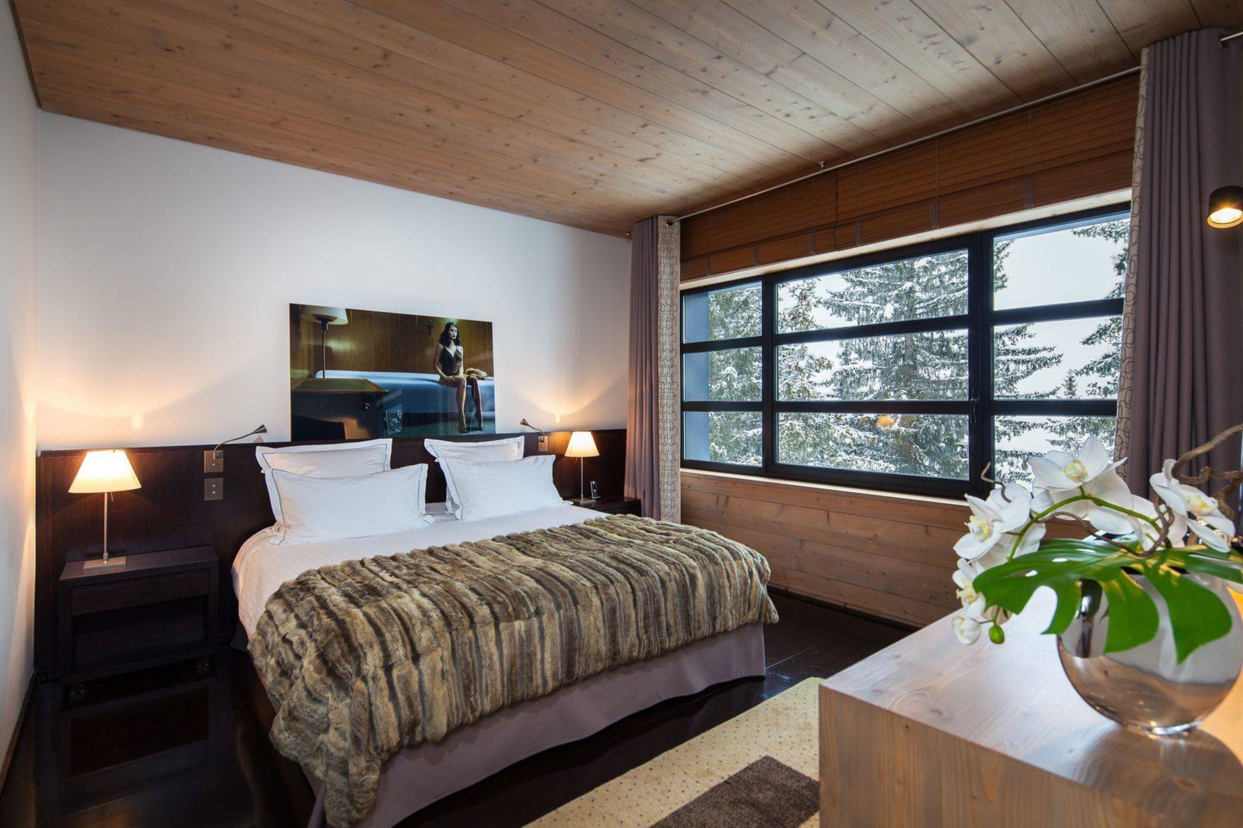 chalet-giselle-bedroom-snow-forest-views-sleek-alpine-interior-luxury-modern-retreat-courchevel1850