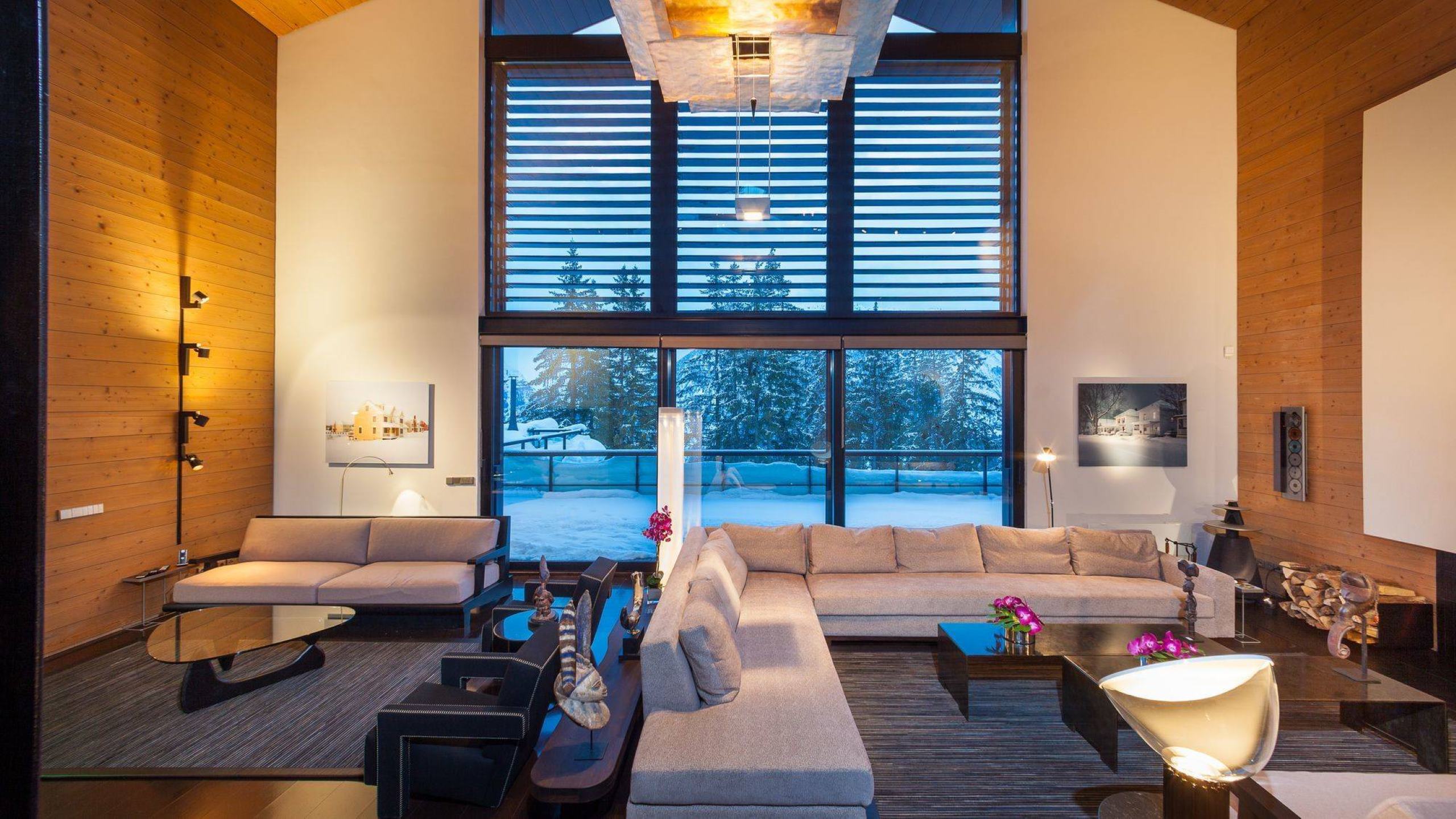 chalet-giselle-mainpage-livingroom-stunning-forest-view-large-openplan-modern-stylish-livingspace-luxury-courchevel1850