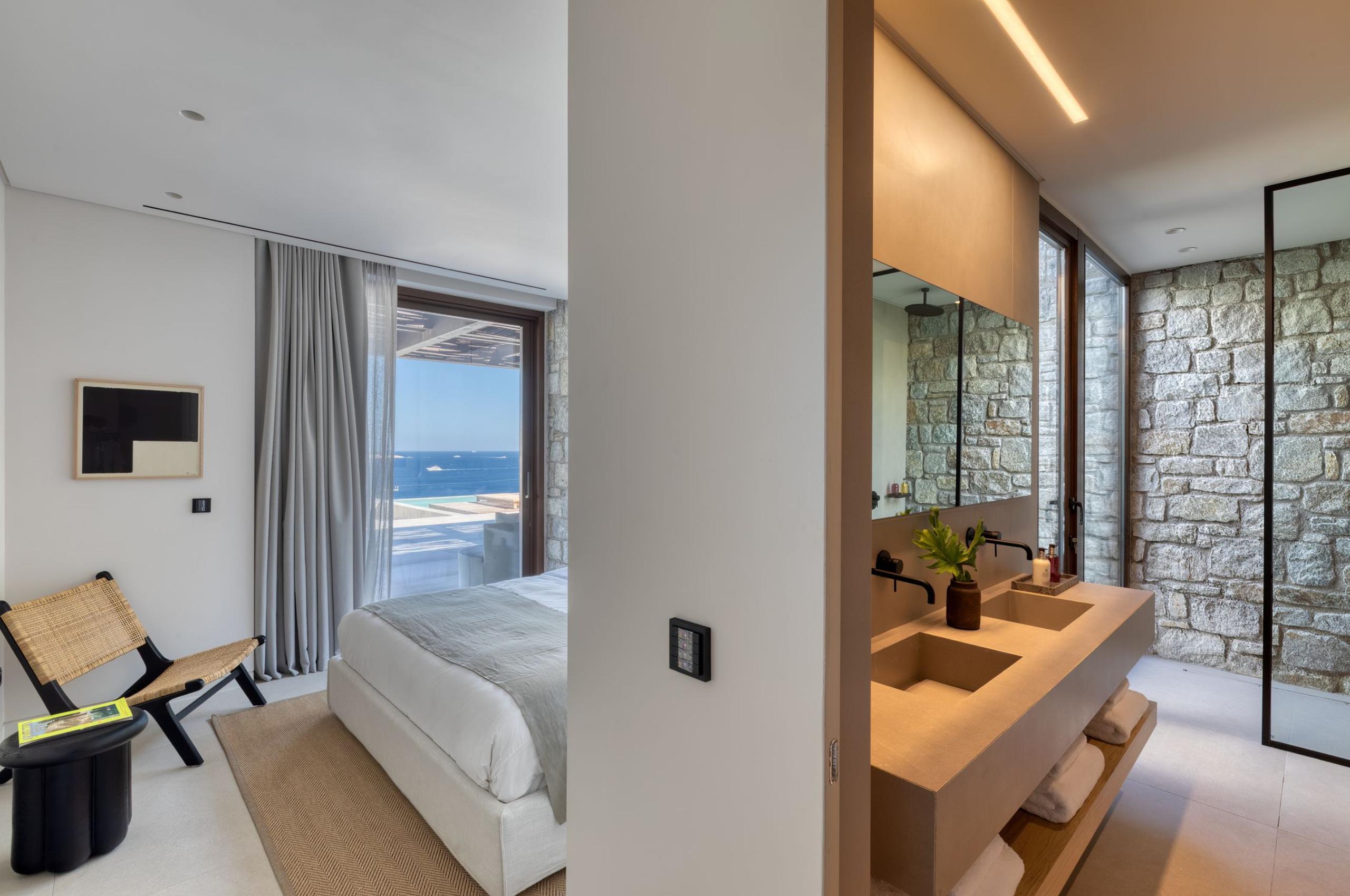 villa-august-bedroom-ensuite-double-sink-shower-sea-view-serene-modern-design-luxury-mykonos