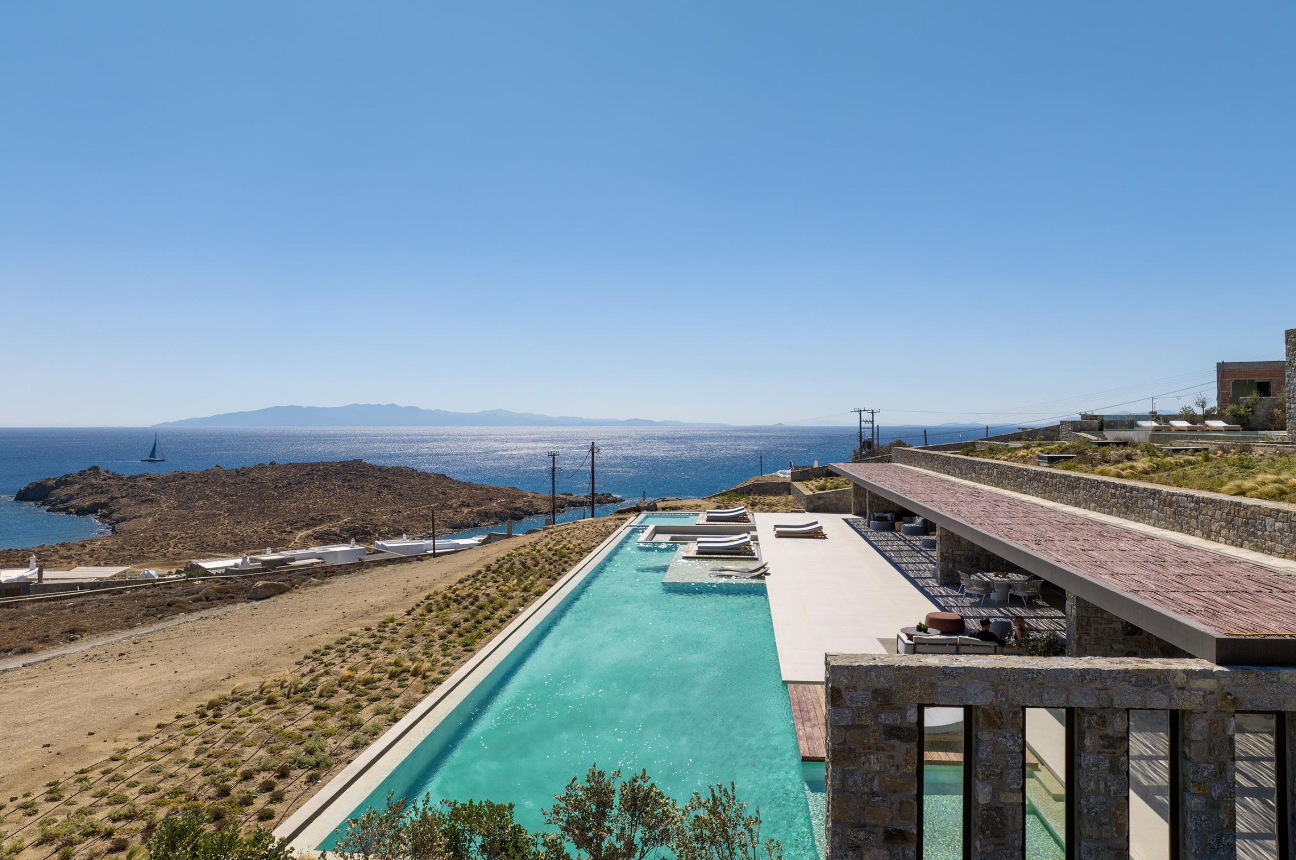 villa-august-exterior-large-swimming-pool-terrace-scenic-sea-views-luxury-mediterranean-retreat-mykonos