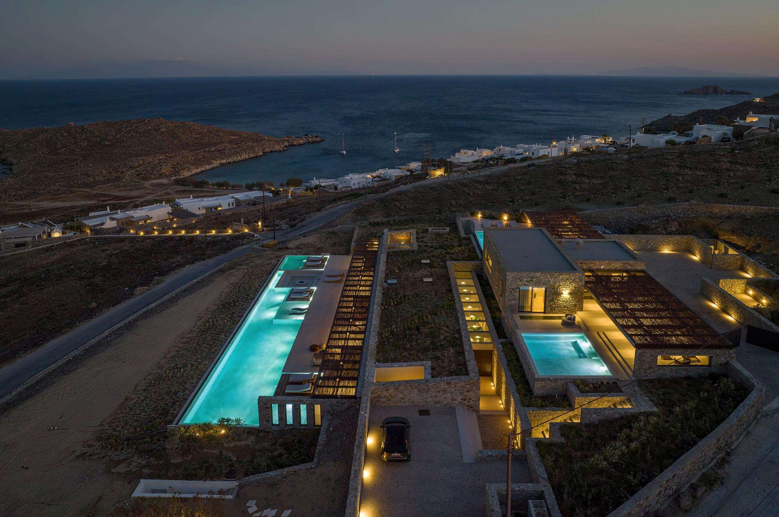 villa-august-exterior-night-modern-mediterranean-architecture-luxury-rental-retreat-sea-views-mykonos