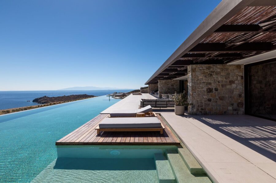 villa-august-infinity-pool-sunloungers-terrace-scenic-sea-views-luxury-mykonos