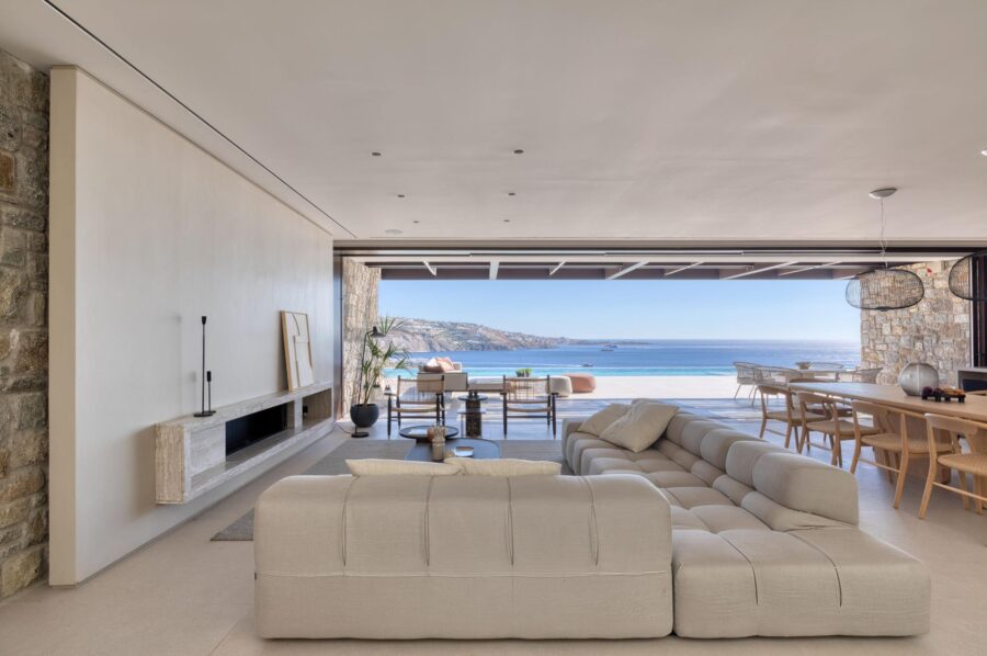 villa-august-living-room-fireplace-sea-view-bright-modern-spacious-interior-design-luxury-mykonos
