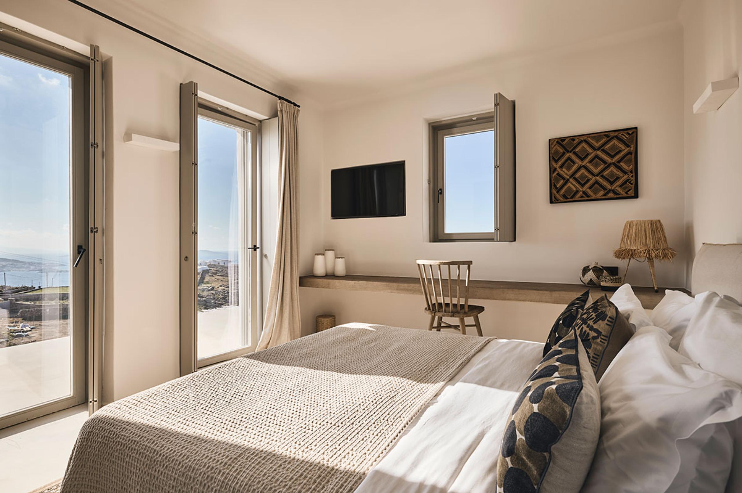villa-daphne-bedroom-desk-sea-view-terrace-access-luxury-design-mykonos