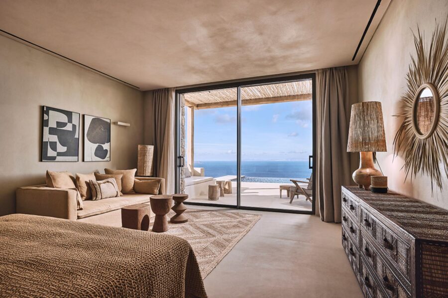 villa-daphne-bedroom-sea-views-sofa-artwork-terrace-access-luxury-mykonos