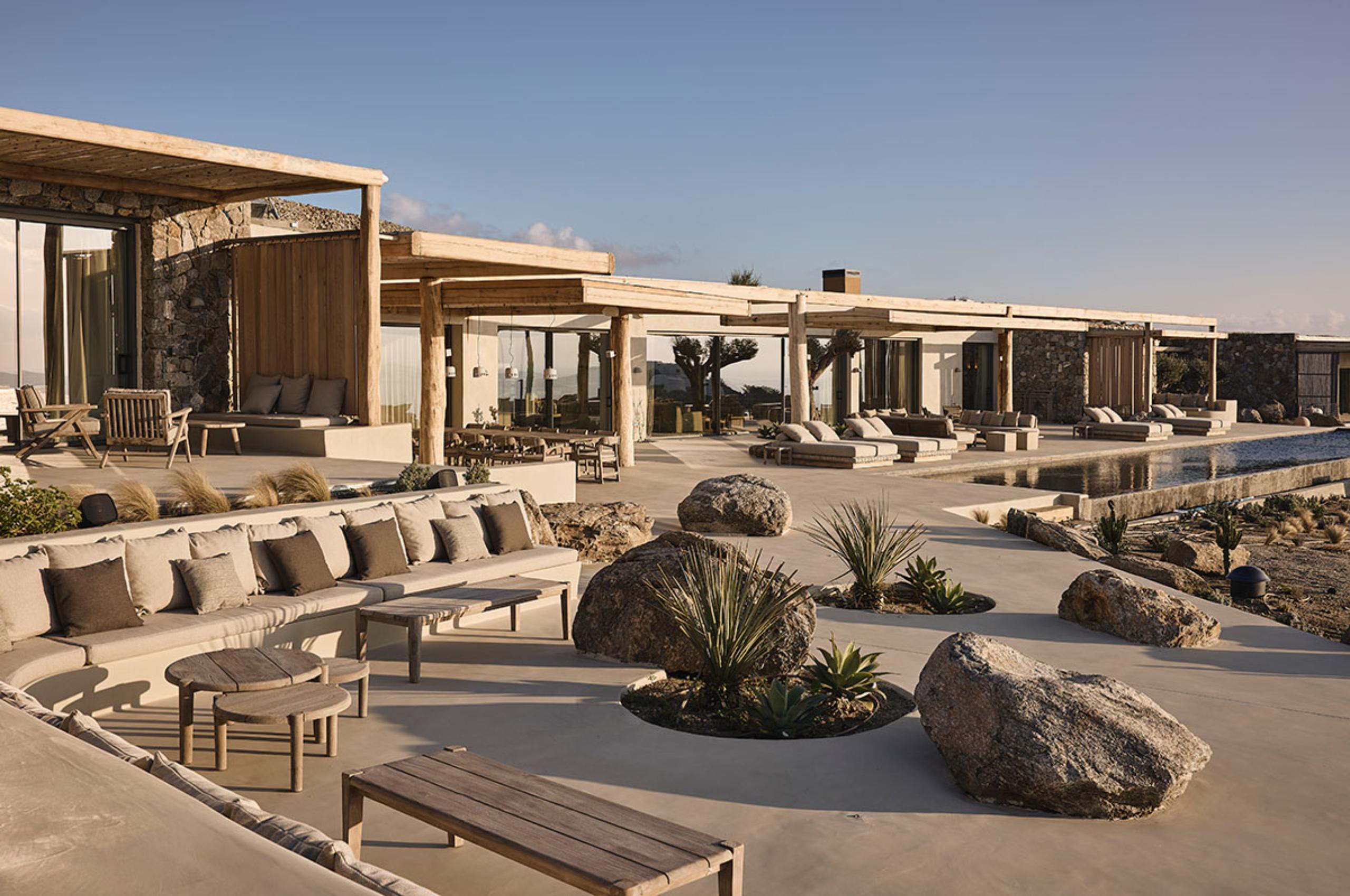 villa-daphne-exterior-terrace-swimming-pool-outdoor-seating-luxury-rental-retreat-mykonos