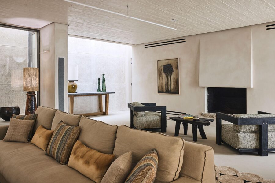 villa-daphne-living-room-fireplace-artwork-stylish-bright-spacious-design-luxury-mykonos