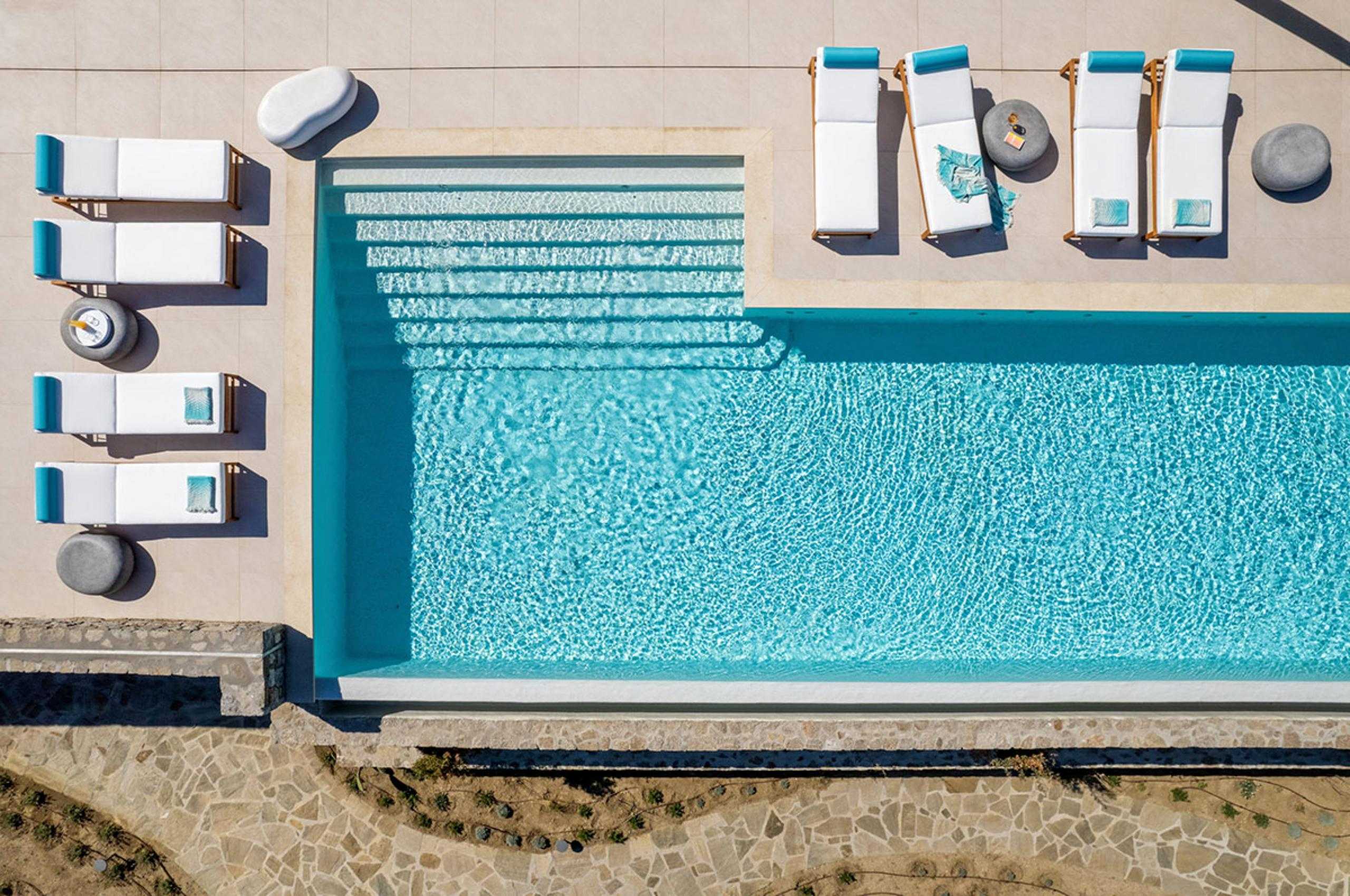 villa-diana-aerial-view-swimming-pool-garden-terrace-sunbeds-luxury-mykonos