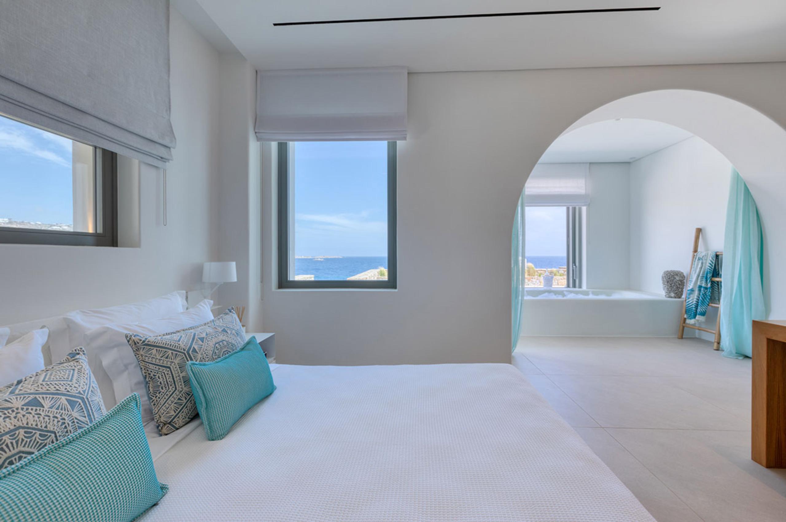 villa-diana-bedroom-scenic-sea-views-ensuite-bathtub-serene-design-luxury-mykonos