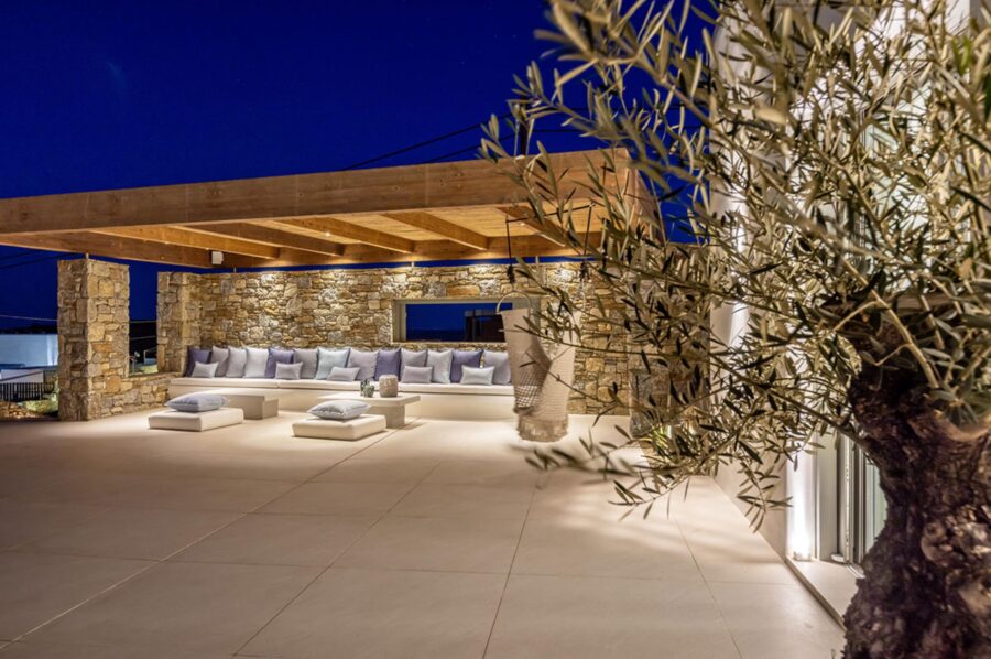villa-diana-exterior-night-outdoor-seating-veranda-covered-luxury-sea-views-mykonos