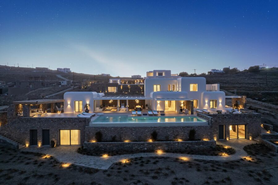 villa-diana-exterior-swimming-pool-terrace-night-luxury-mediterranean-rental-retreat-mykonos