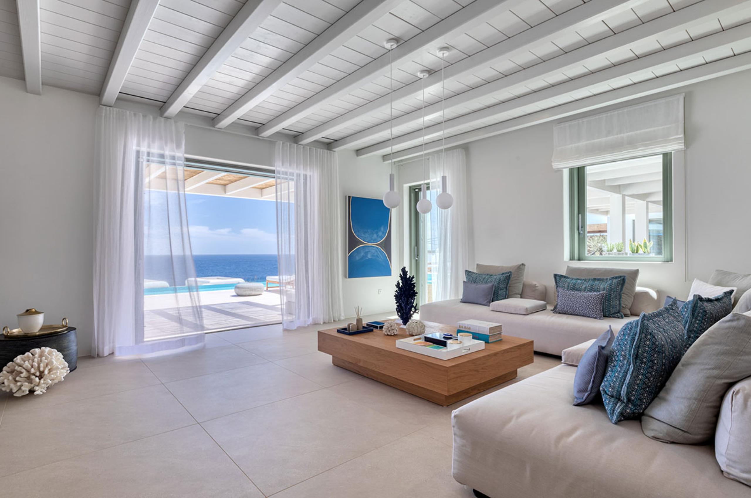 villa-diana-living-room-scenic-sea-views-terrace-access-bright-modern-luxury-mykonos