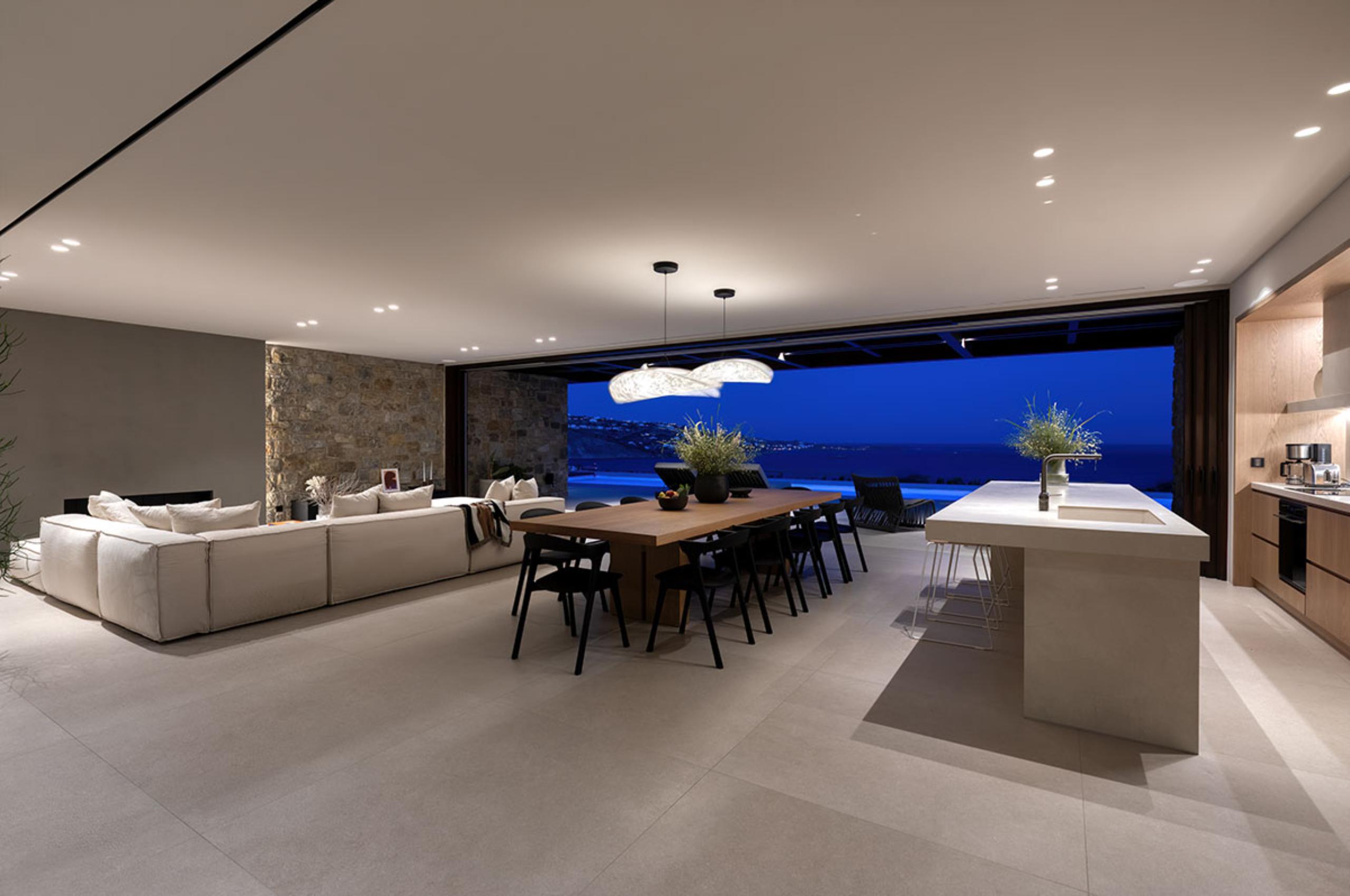 villa-lyra-living-area-kitchen-dining-room-lounge-sea-view-openplan-luxury-mykonos