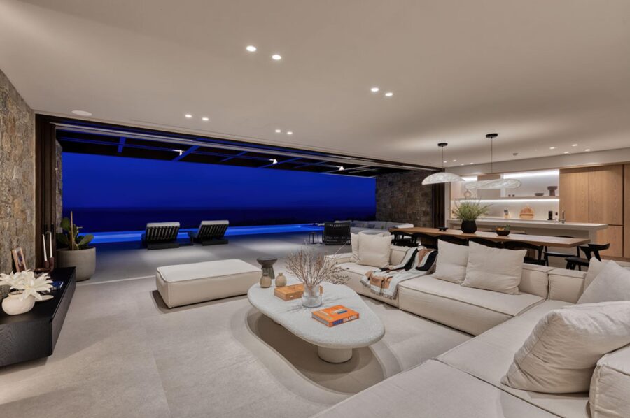villa-lyra-living-room-night-sea-view-openplan-luxury-rental-retreat-mykonos