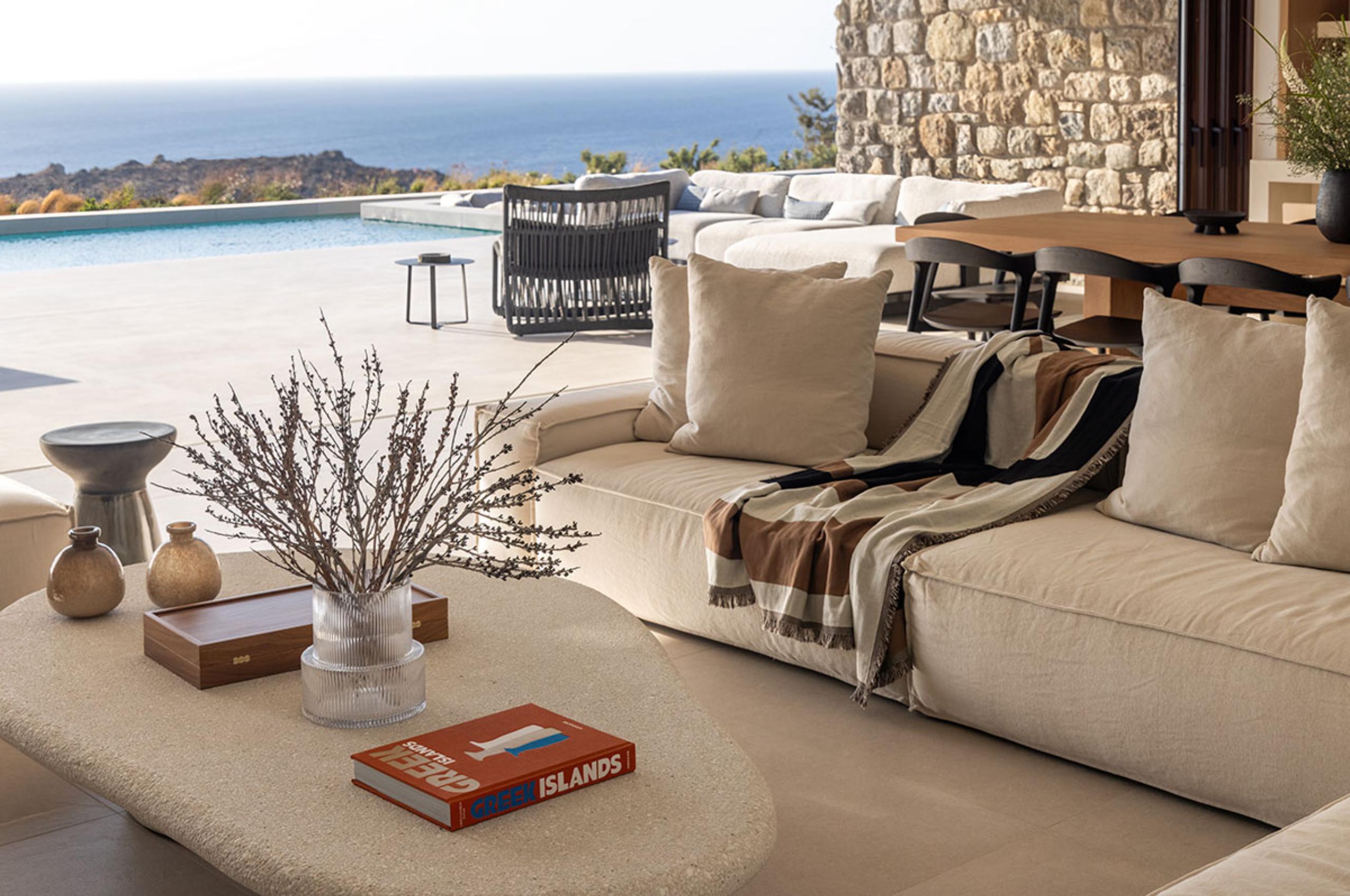villa-lyra-living-room-openplan-indoor-outdoor-living-sea-view-bright-modern-design-luxury-mykonos