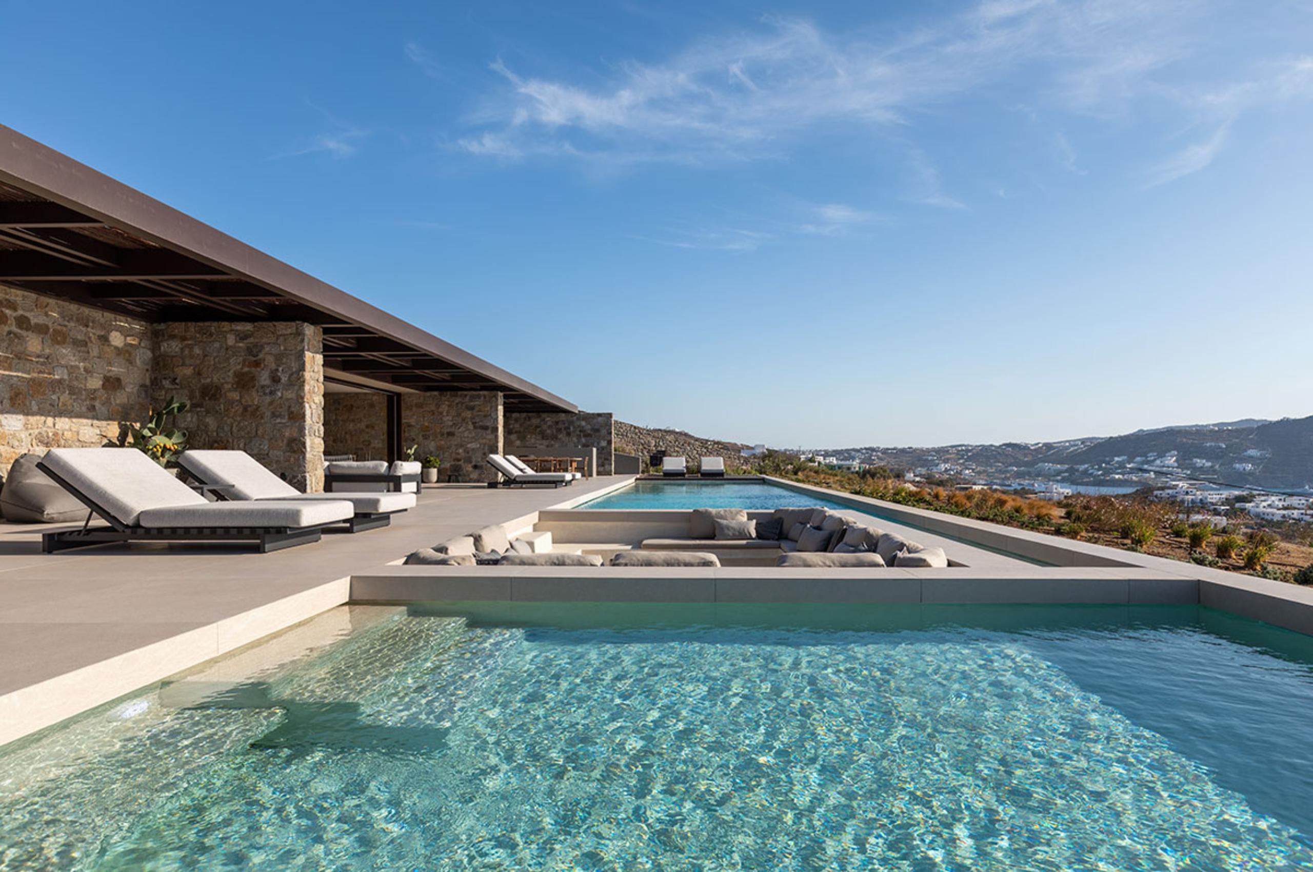 villa-lyra-swimming-pool-firepit-scenic-sea-view-terrace-sunloungers-luxury-mykonos