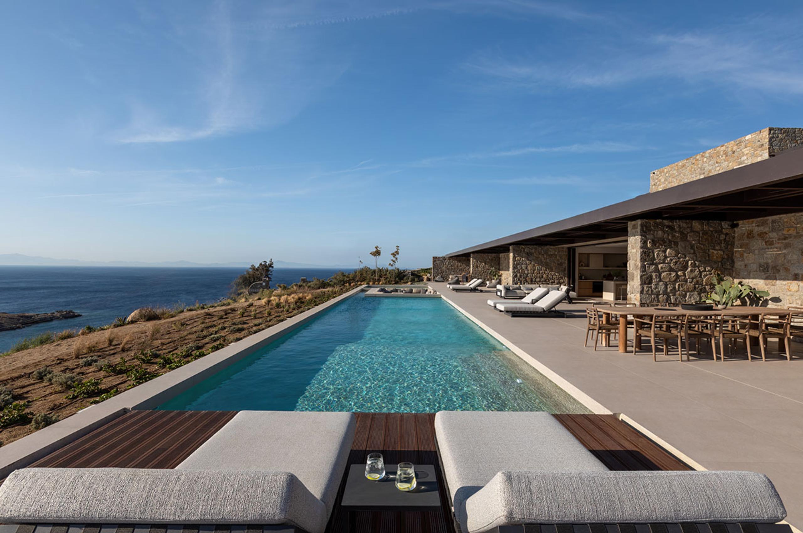 villa-lyra-swimming-pool-sunloungers-terrace-sea-view-luxury-rental-retreat-mykonos