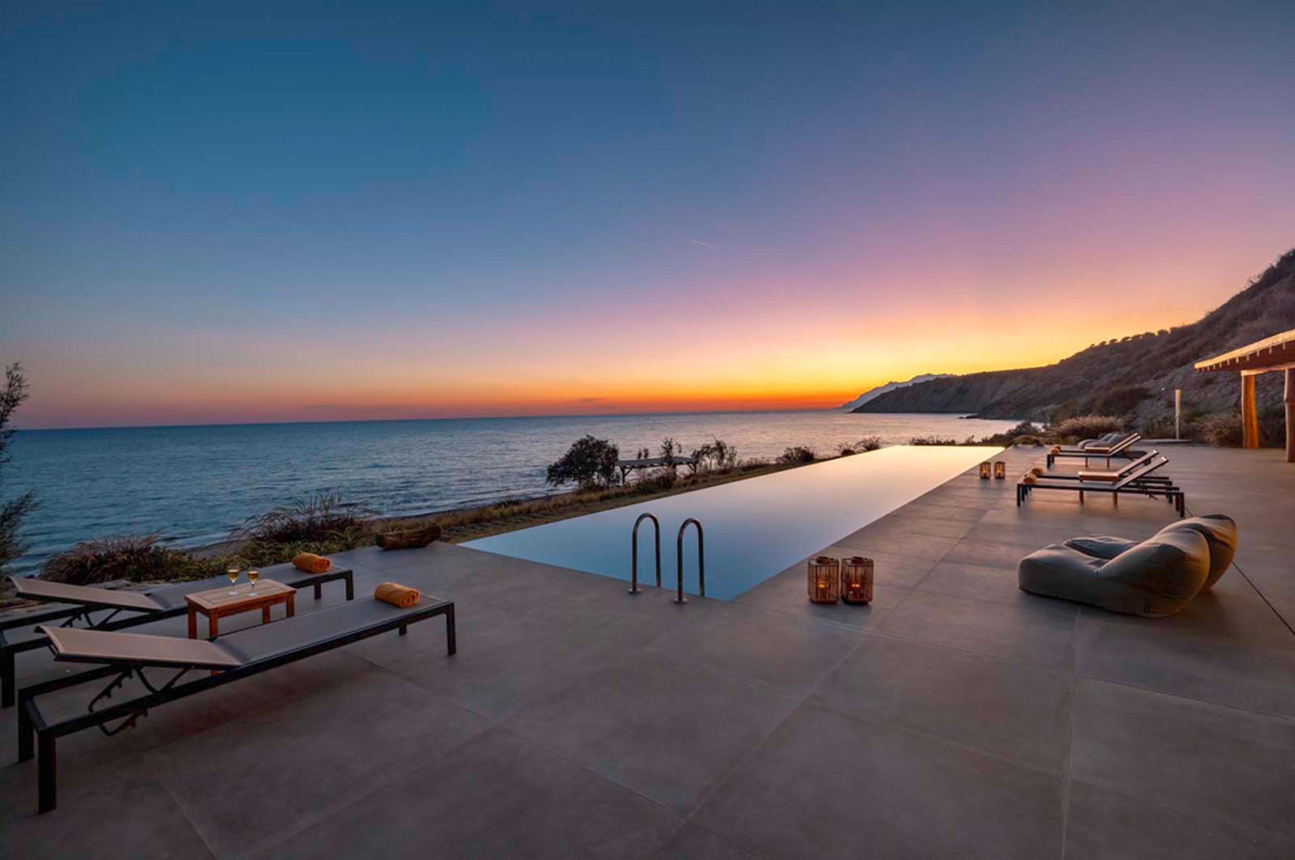 villa-nadia-terrace-infinity-swimming-pool-sunset-luxury-crete