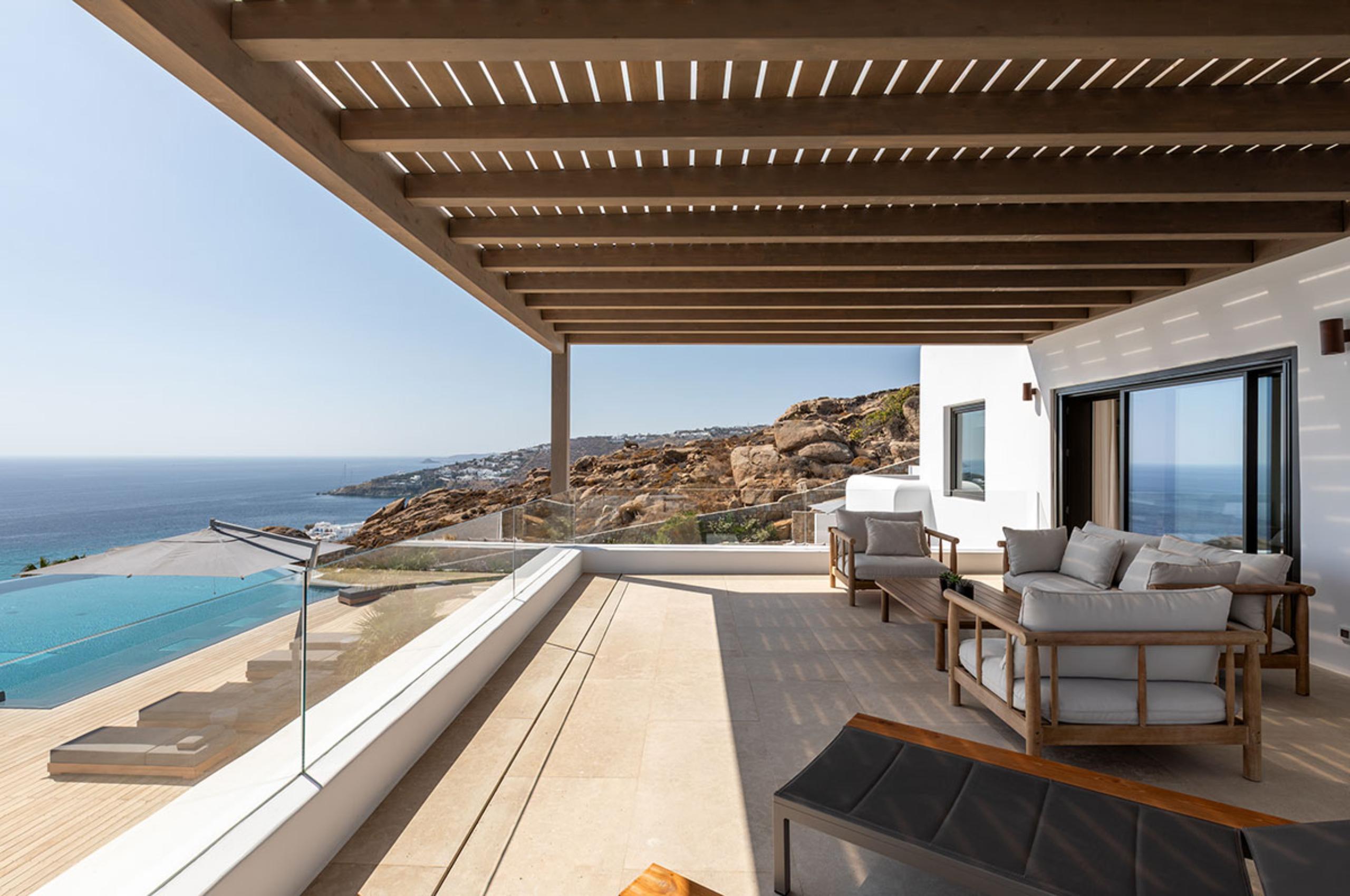 villa-petra-balcony-scenic-sea-views-pool-views-alfresco-lounge-luxury-mykonos