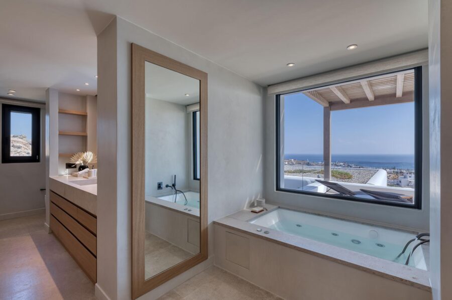 villa-petra-bathroom-jacuzzi-bathtub-sink-scenic-sea-views-modern-luxury-mykonos