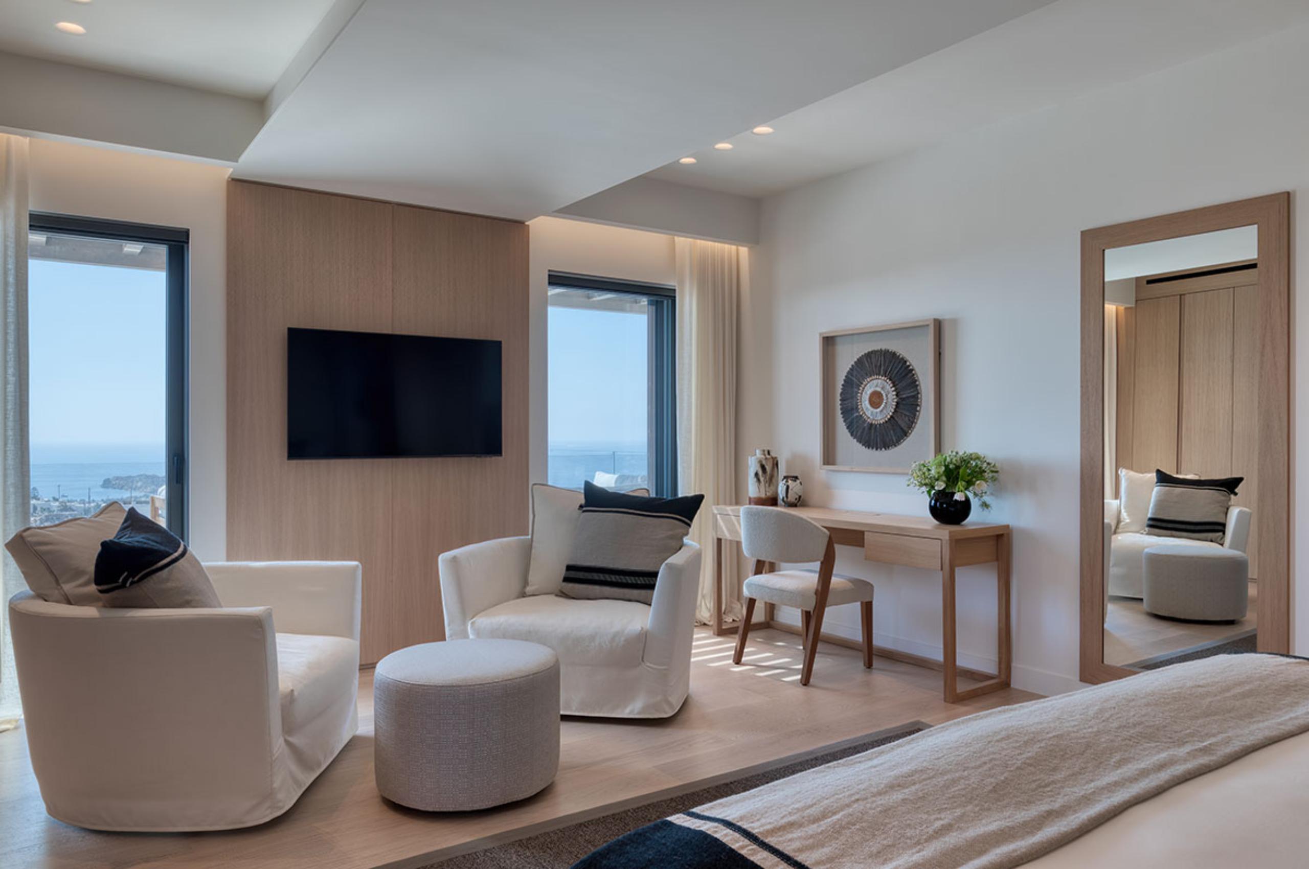 villa-petra-bedroom-lounge-tv-desk-scenic-sea-views-luxury-mykonos